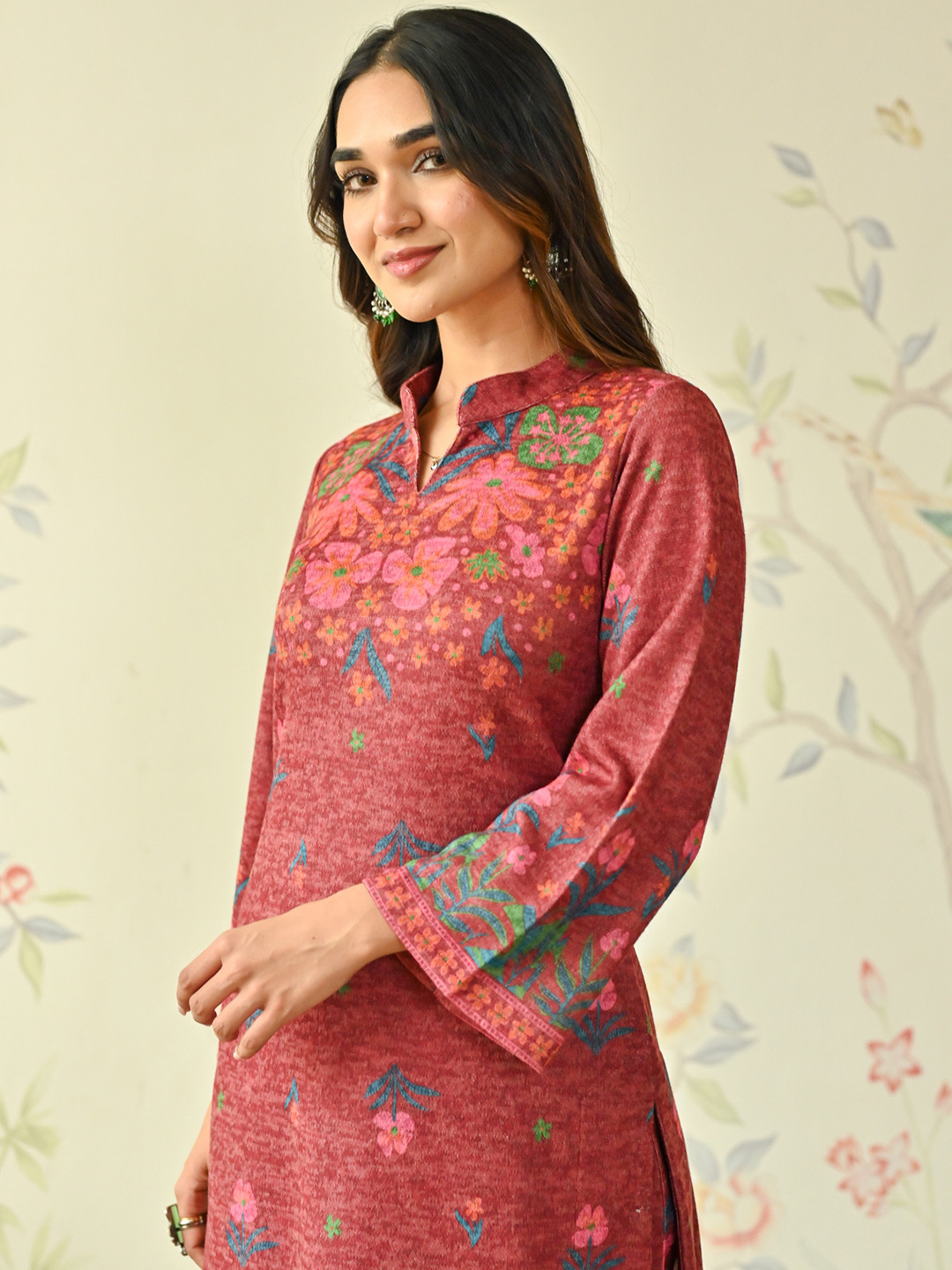 

Rustorange Floral Printed Mandarin Collar Bell Sleeves A-Line Woollen Kurta, Maroon