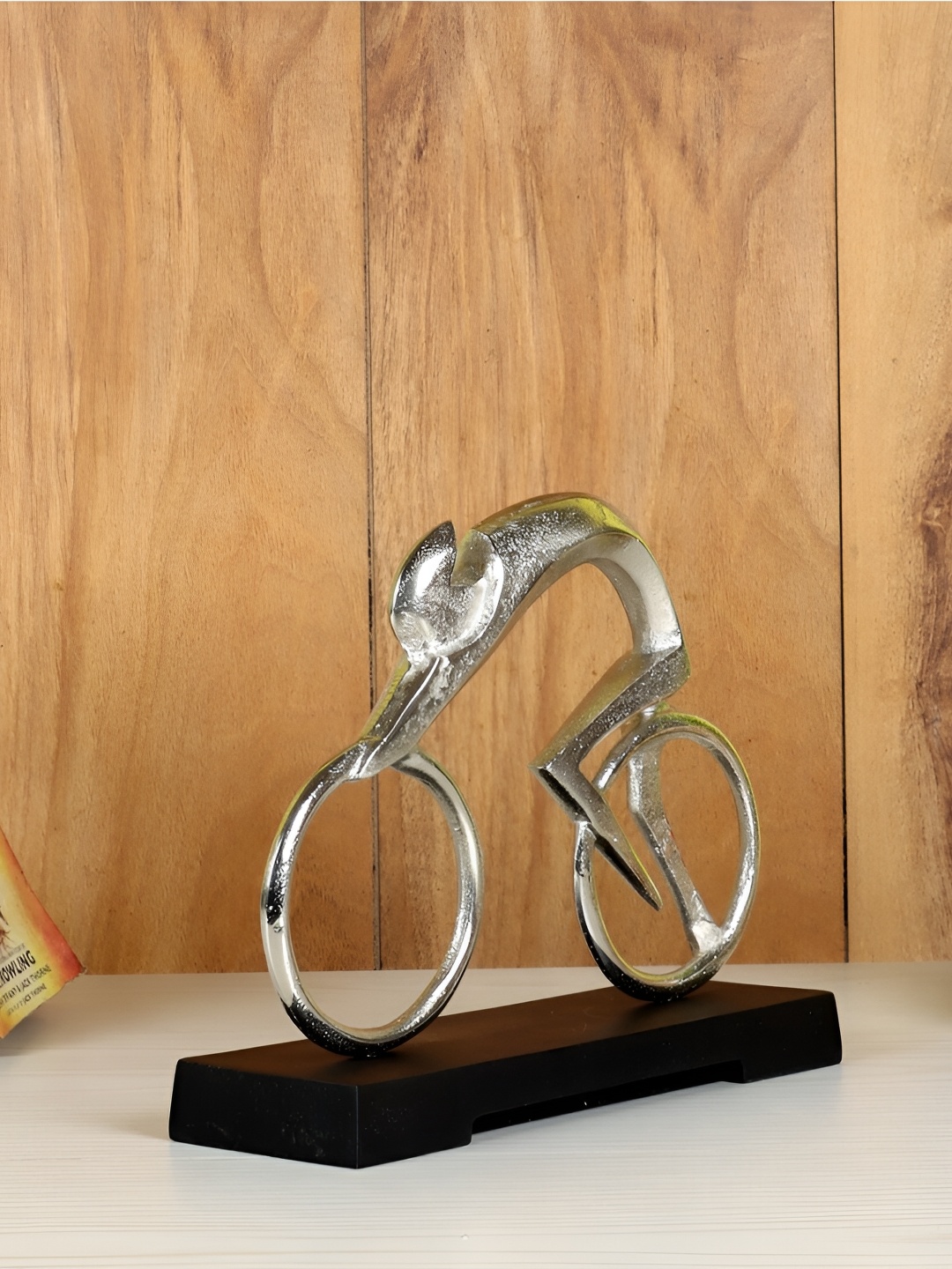 

Decor de Maison Silver-Toned Bicycle Man Showpiece
