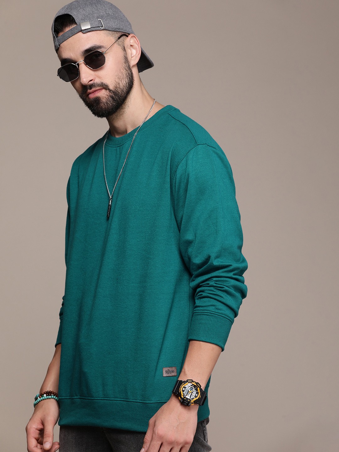 

Roadster Men Solid Sweatshirt, Green