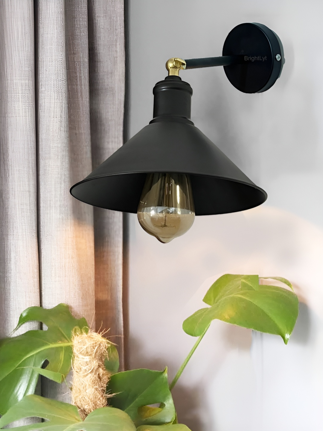 

BrightLyt Black Frustum Shaped Metal Wall Lamp