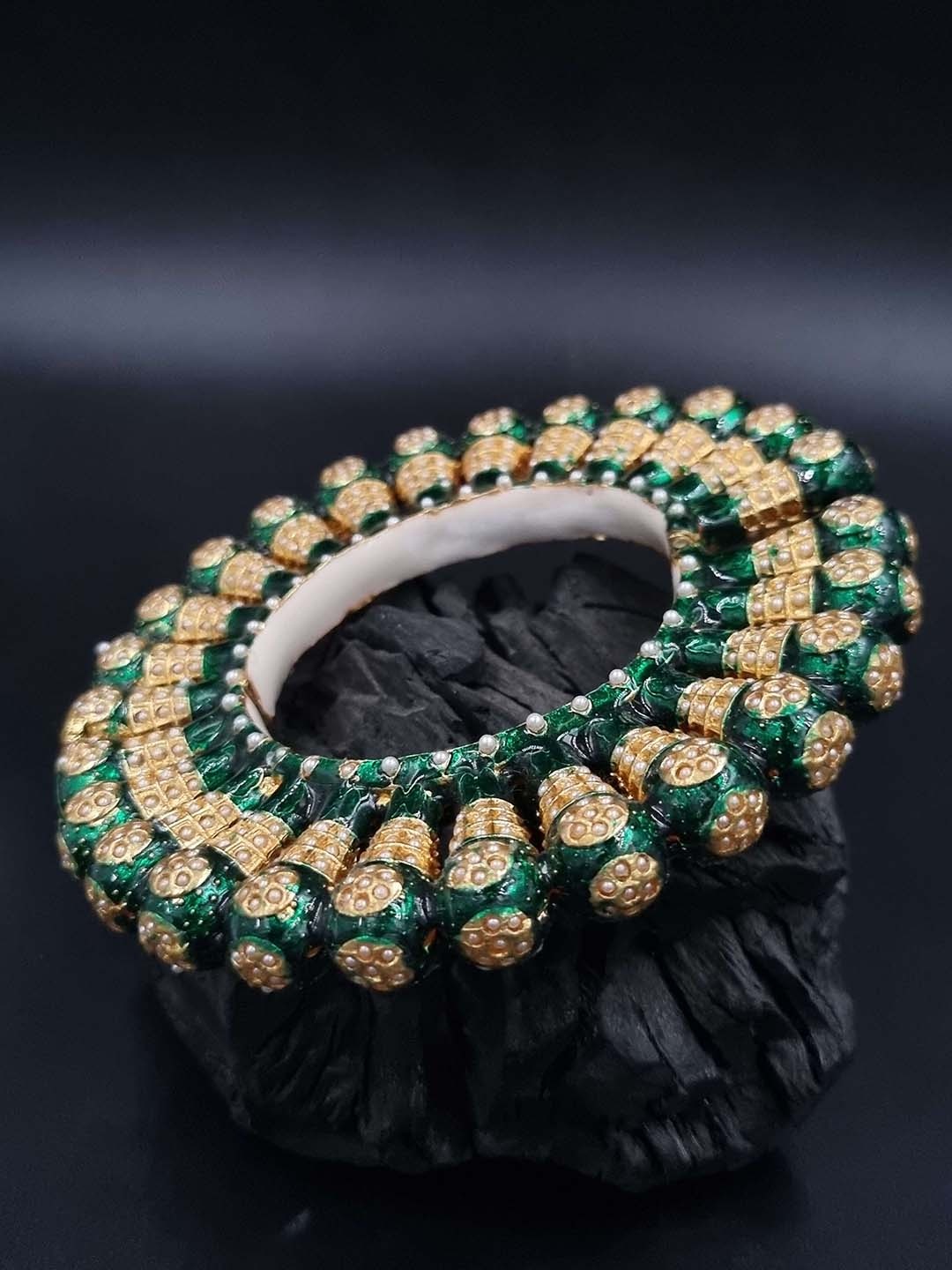 

Anouk Gold Plated Bead Studded Ethnic Rajasthani Bangle