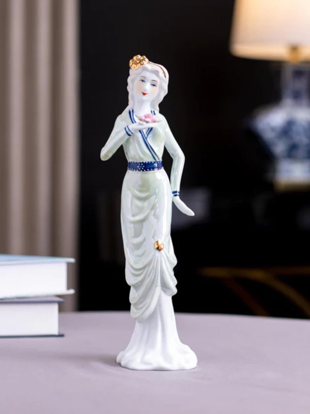 

THEDECORKART White & Blue Lady Figurine Ceramic Showpiece