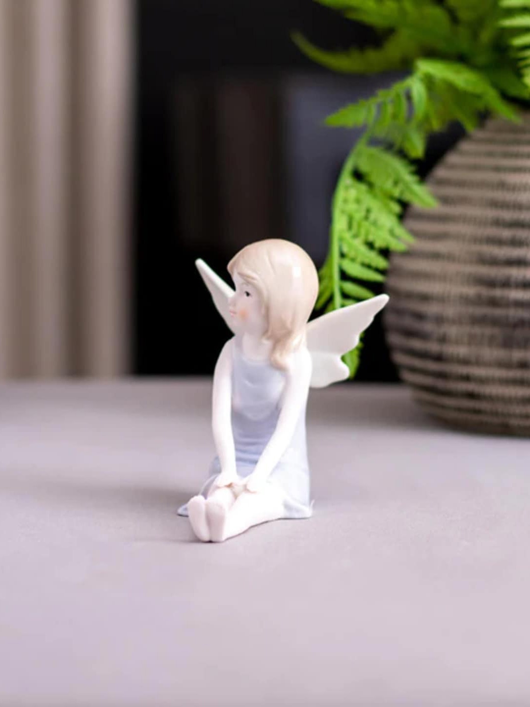 

THEDECORKART White & Blue Ceramic Angel Figurine Showpiece