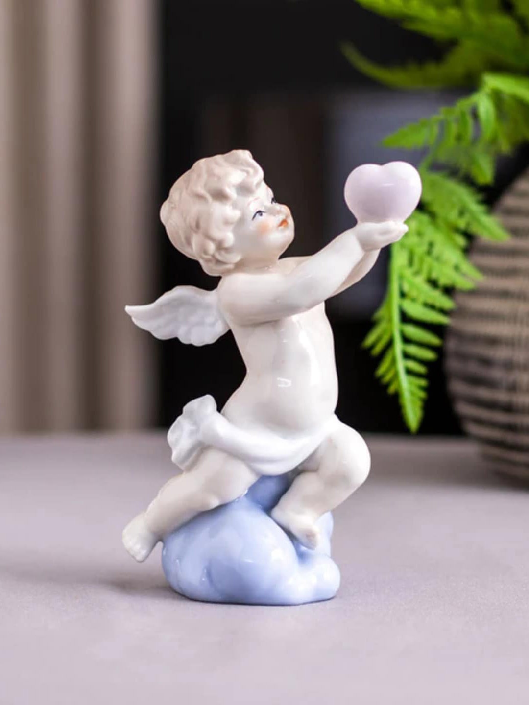 

THEDECORKART White & Blue Baby Angel With Heart Figurine Showpiece