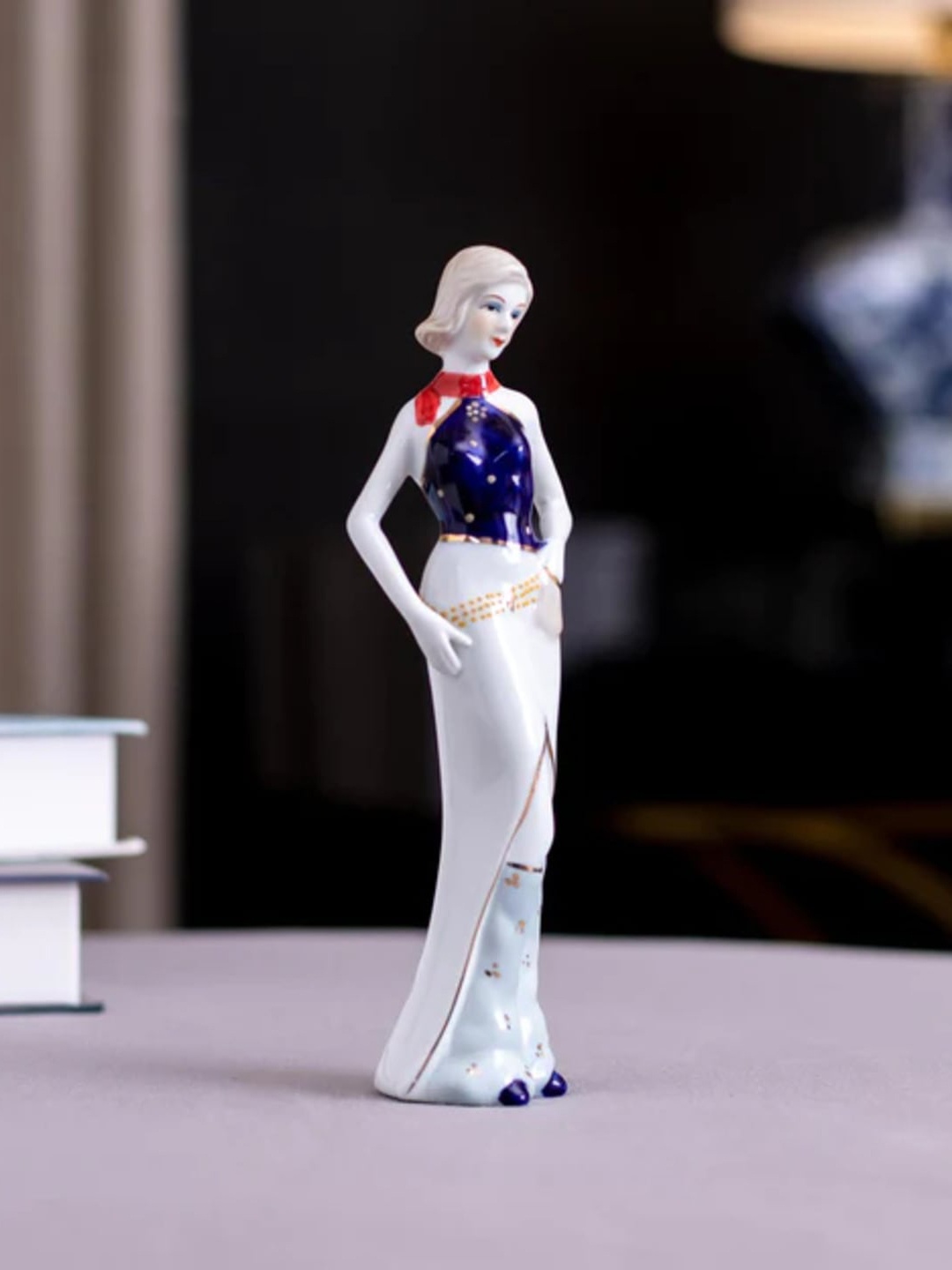 

THEDECORKART White & Blue Lady Ceramic Figurine Showpiece