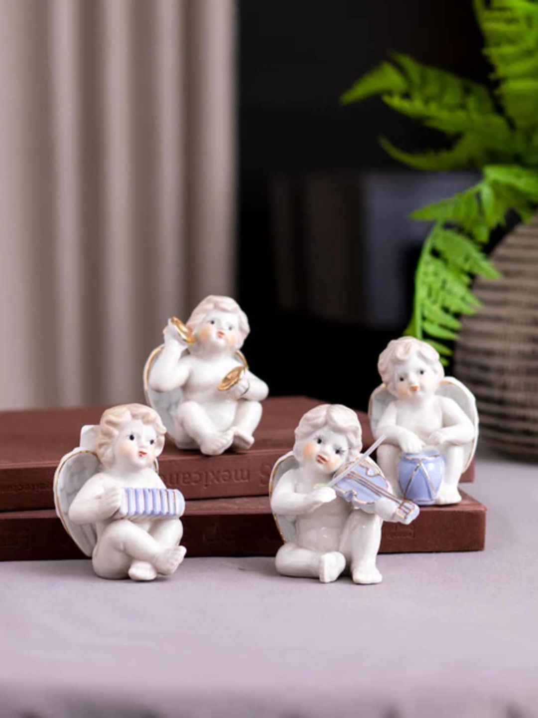 

THEDECORKART 4 Pcs White & Blue Ceramic Angelic Musician Figurine Showpieces