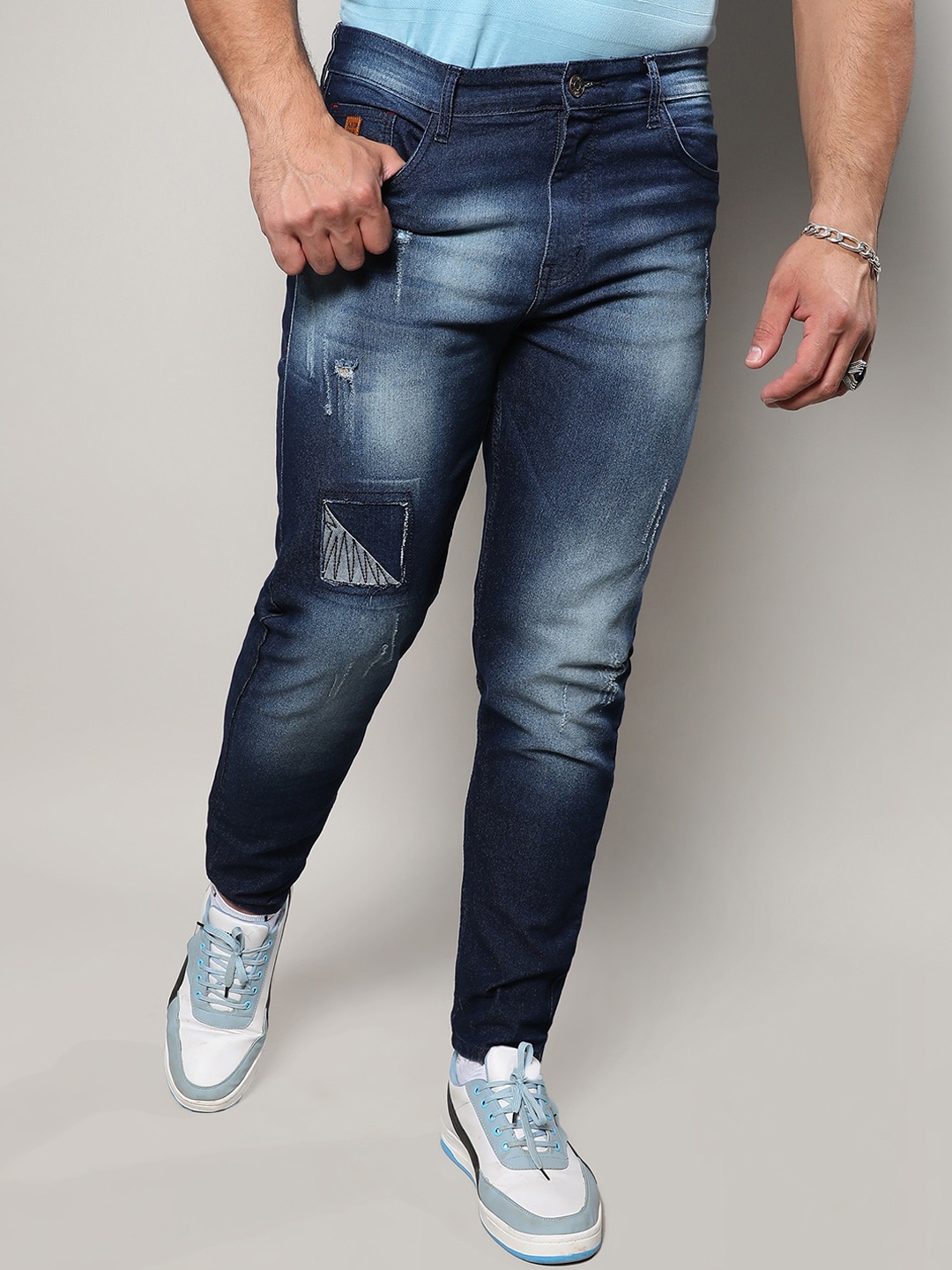 

Instafab Plus Men Jean Mildly Distressed Relaxed Fit Light Fade Stretchable Cotton Jeans, Navy blue