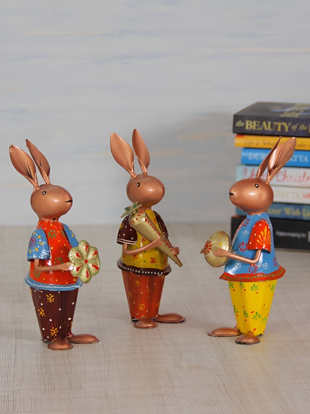 

HANDICRAFTS PARADISE Red & Beige Rabbit Figurine Showpiece