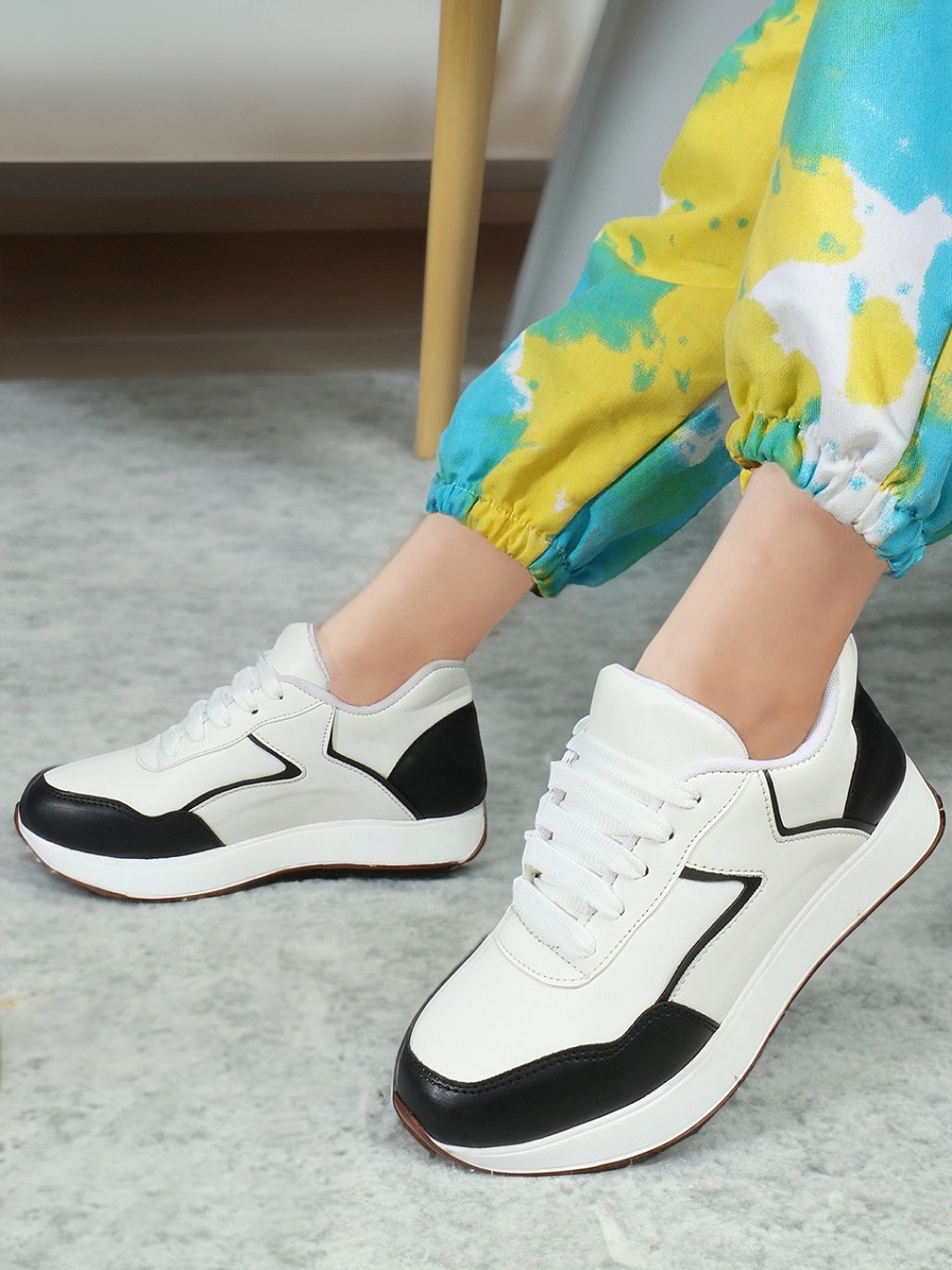 

The Roadster Lifestyle Co. Women White & Black Colourblocked Comfort Insole Sneakers