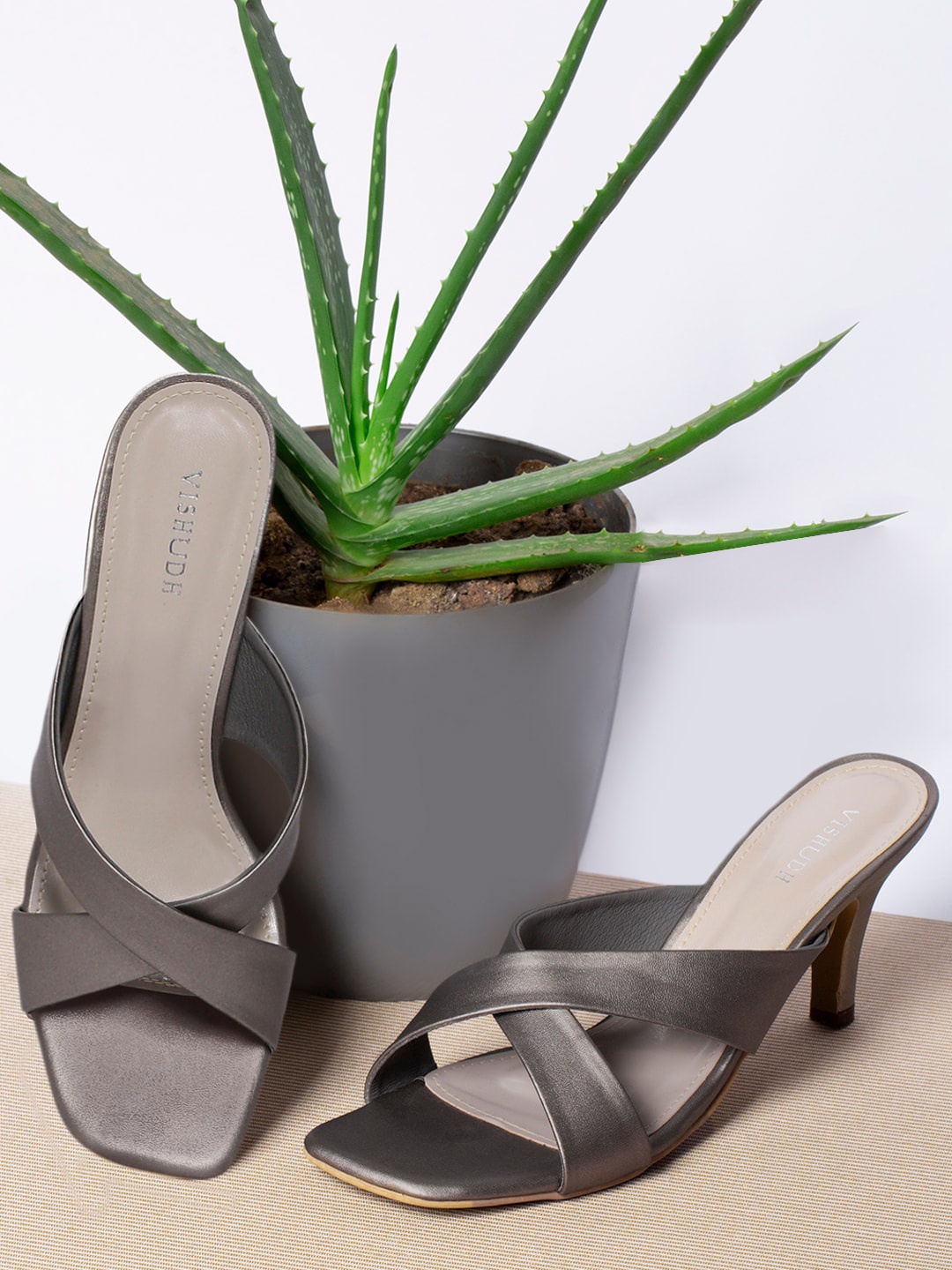

Vishudh Grey Cross Strap Open Toe Slim Heels