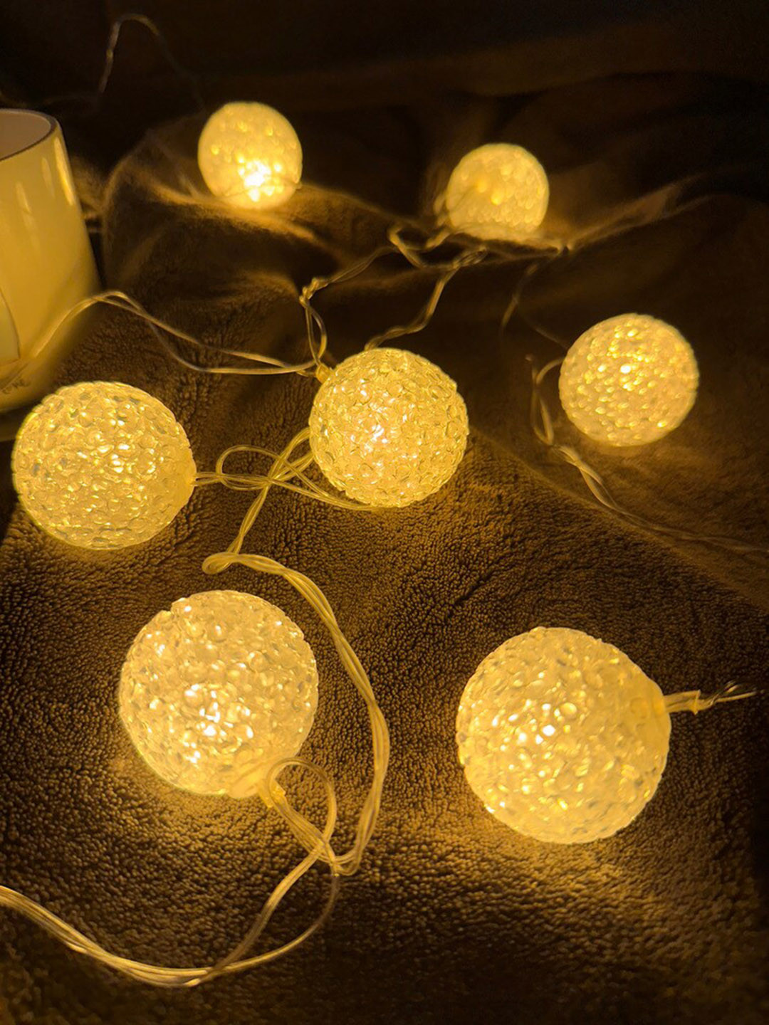 

Glimmer Lightings Yellow Textured Crystal Ball String Lights