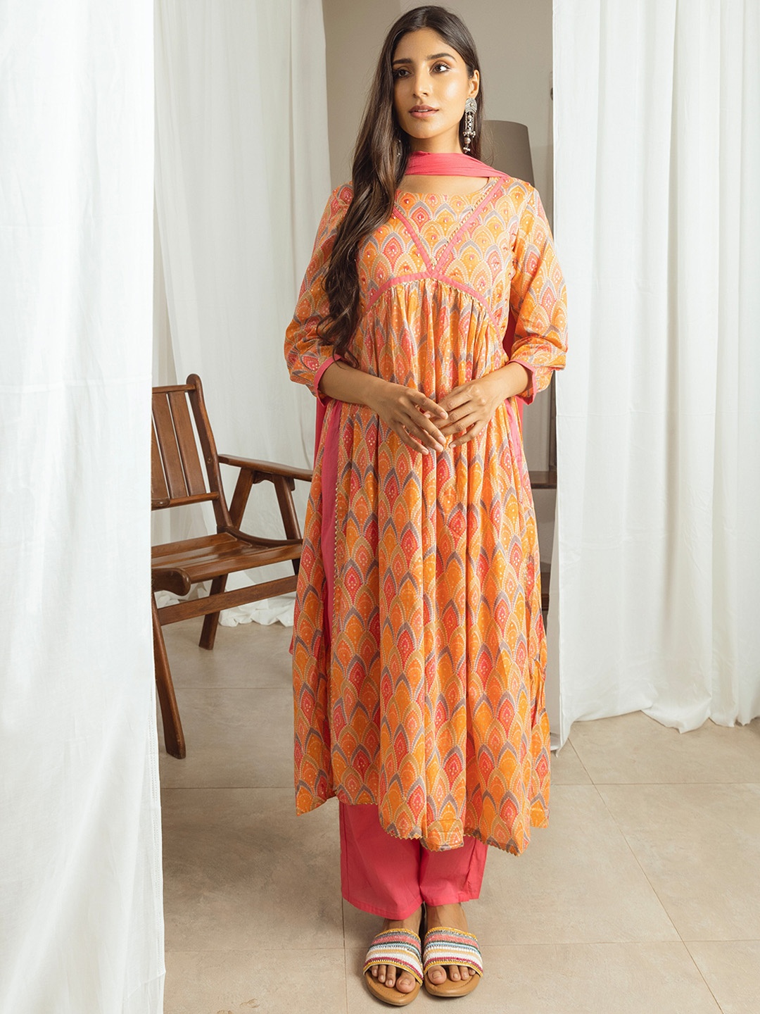 

Sangria Ethnic Motifs Printed Pure Cotton A-Line Kurta Set, Orange