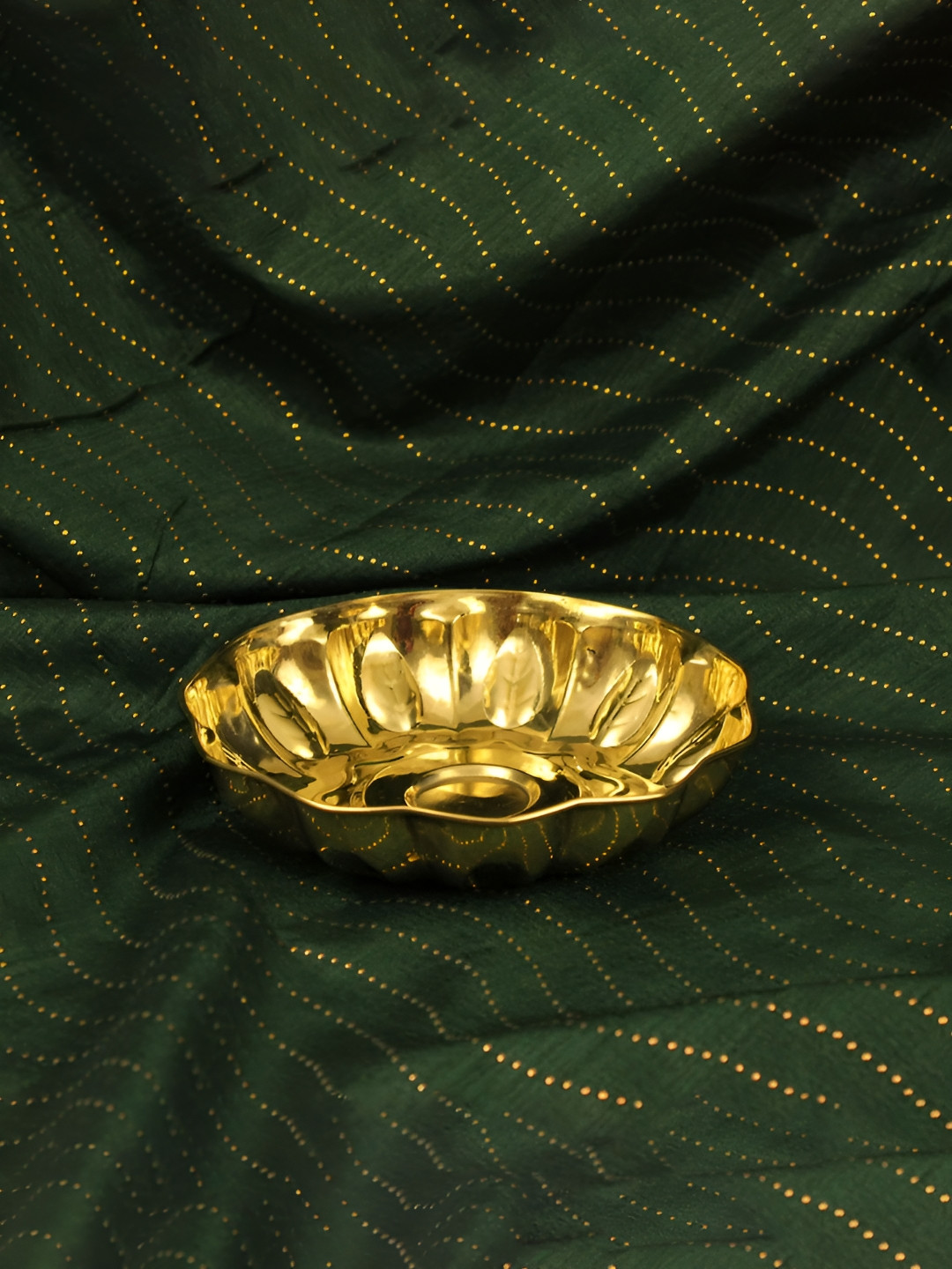 

Spillbox Gold Toned Textured Pooja Thali