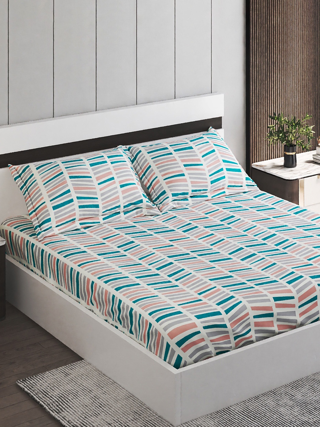

Home Centre White & Teal Geometric Cotton 150 TC King Bedsheet with 2 Pillow Covers
