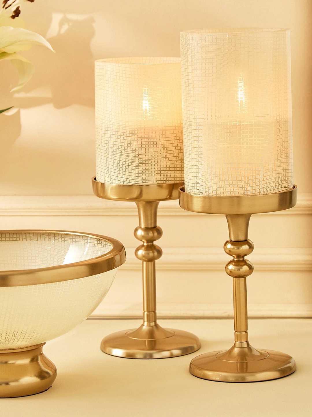 

Home Centre Beige Pedestal Votive Candle Holders