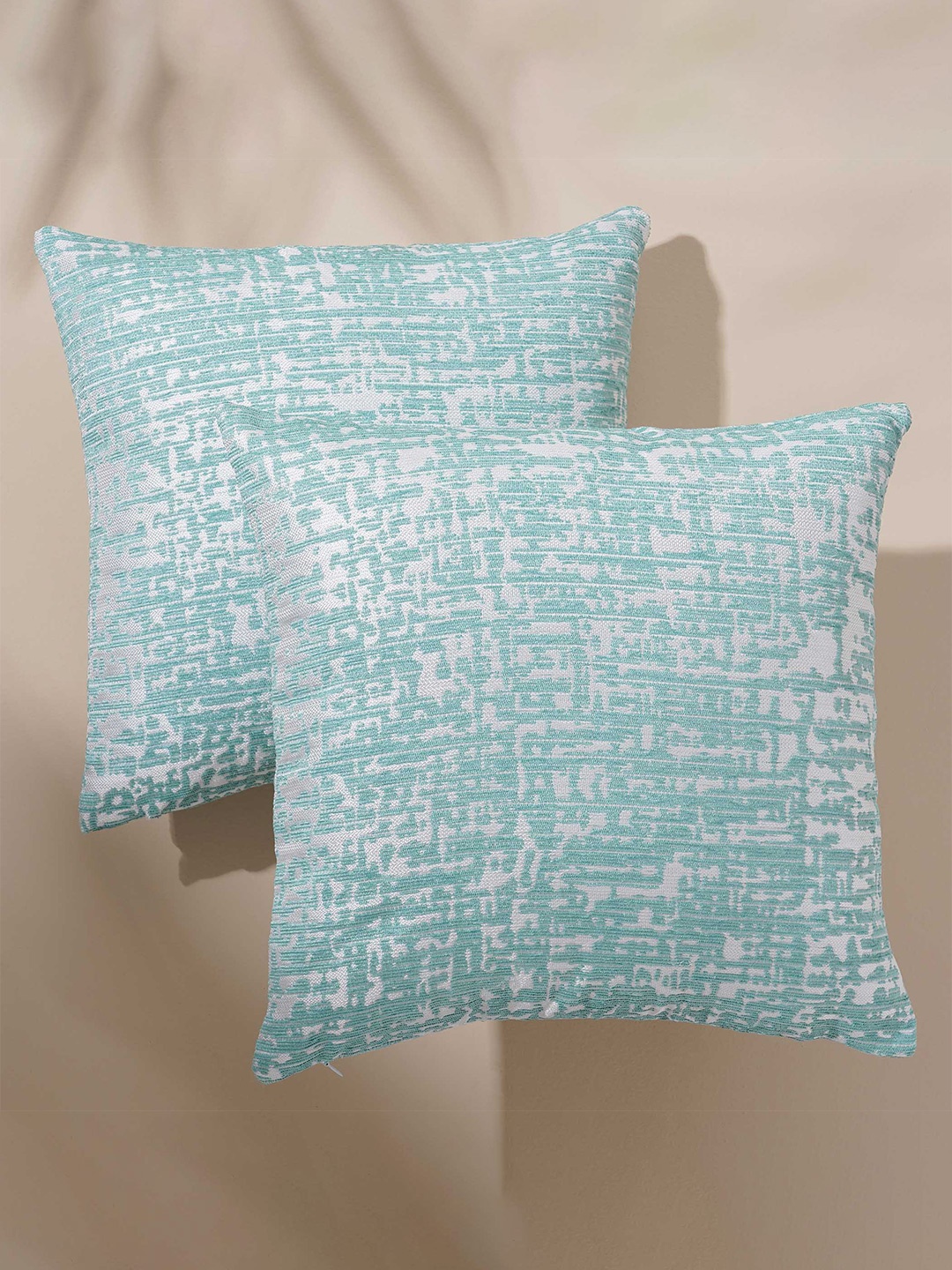 

Home Centre Celebrations Teal 2 Pieces Abstract Jacquard Square Cushion Covers