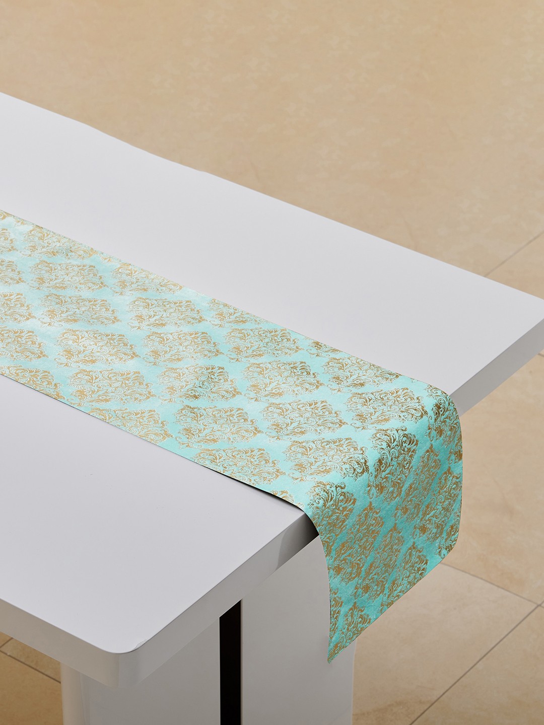 

Home Centre Teal & Gold Toned Ebony Foil Printed Table Runner