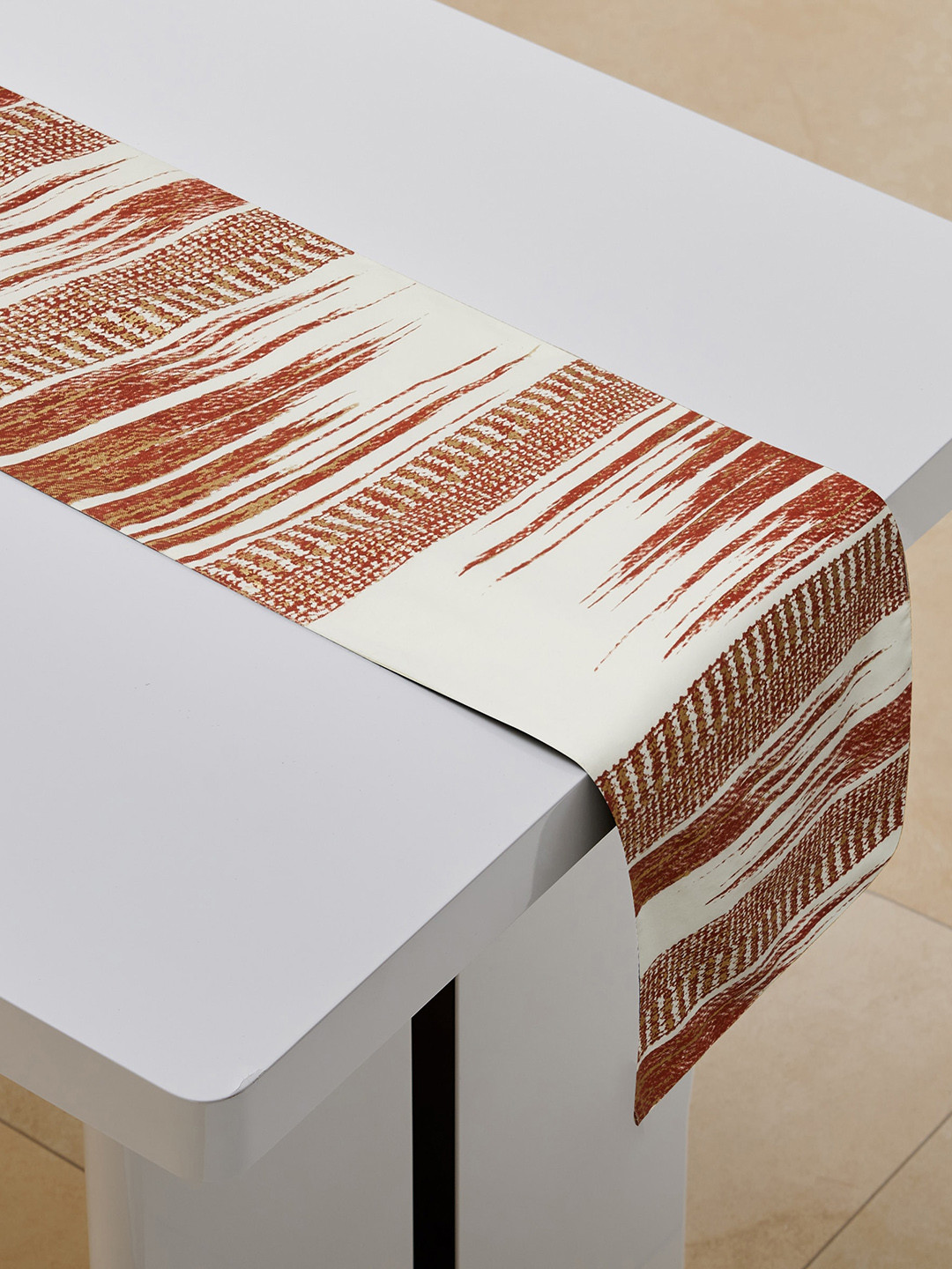 

Home Centre White & Red Corsica Foil Printed Table Runner