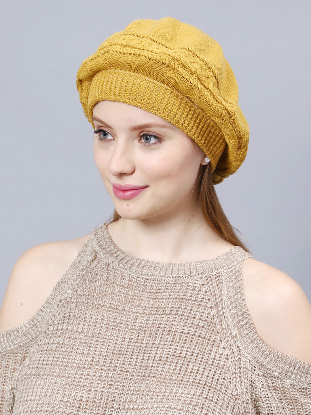 

Bharatasya Self Design Knitted Cotton Beanie, Yellow