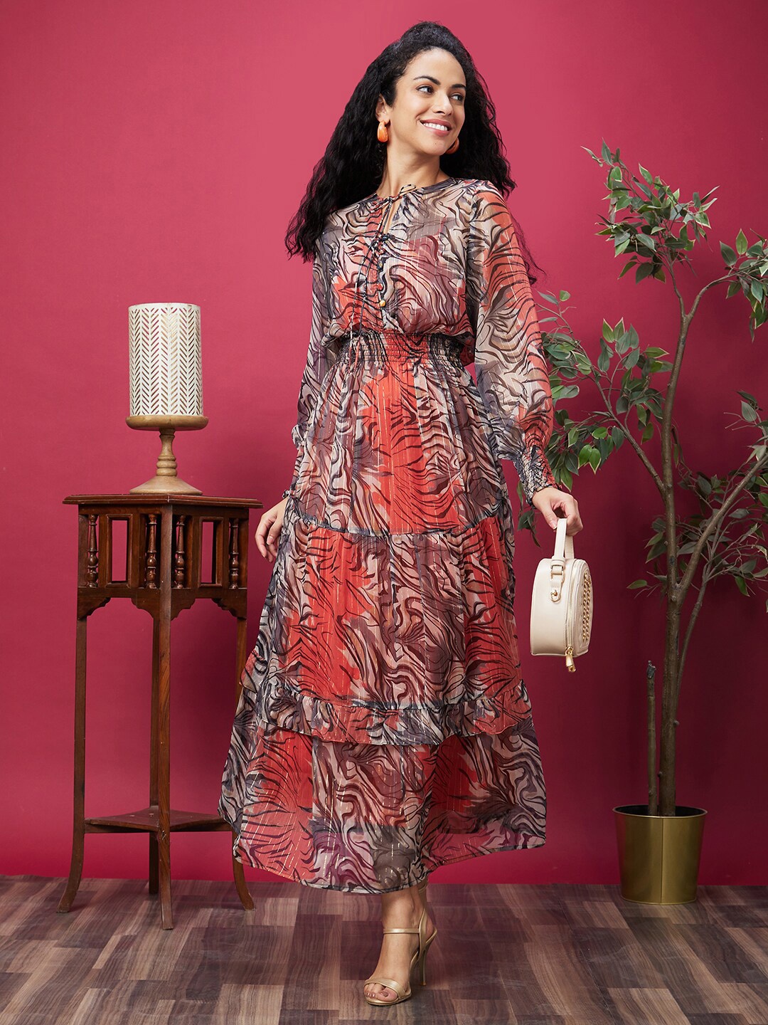 

Globus Orange Abstract Printed Tie-Up Neck Bishop Sleeves Georgette Maxi Dress With Slip