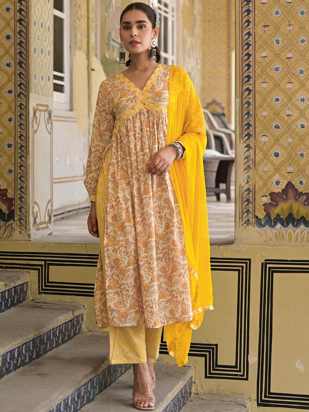 

The Kapas Floral Printed V-Neck Puffed Sleeves Pure Cotton Kurta with Trousers & Dupatta, Mustard