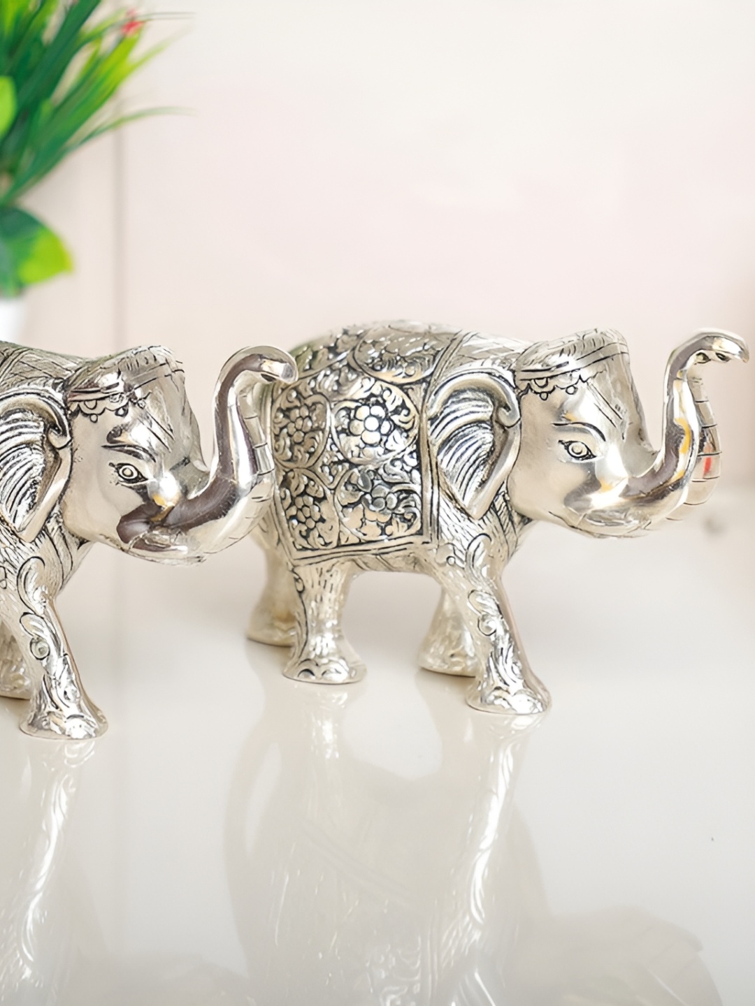 

Kridaykraft Silver-Toned Elephant Figurine Metal Showpiece