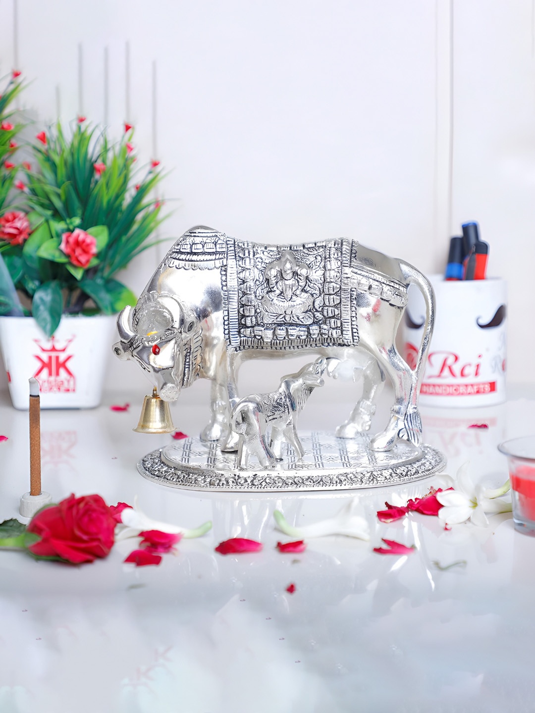 

Kridaykraft Silver-Toned Kamdhenu Cow With Calf Figurine Metal Showpiece