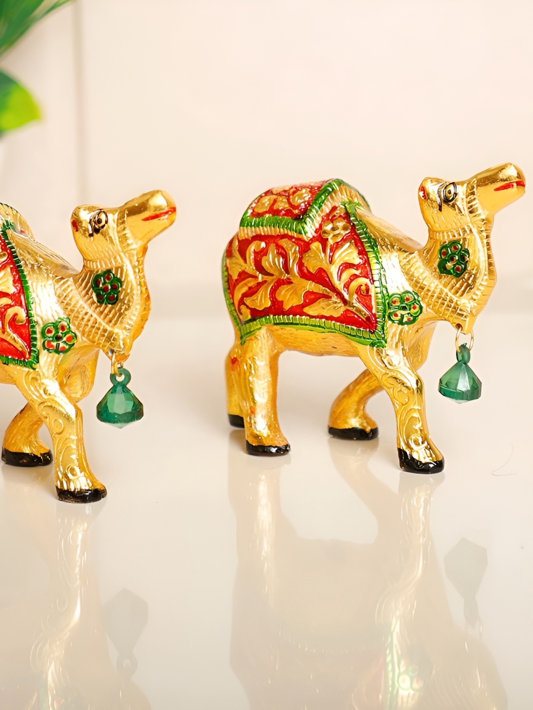 

Kridaykraft 2 Pcs Golden & Red Camel Figurine Metal Showpieces, Gold