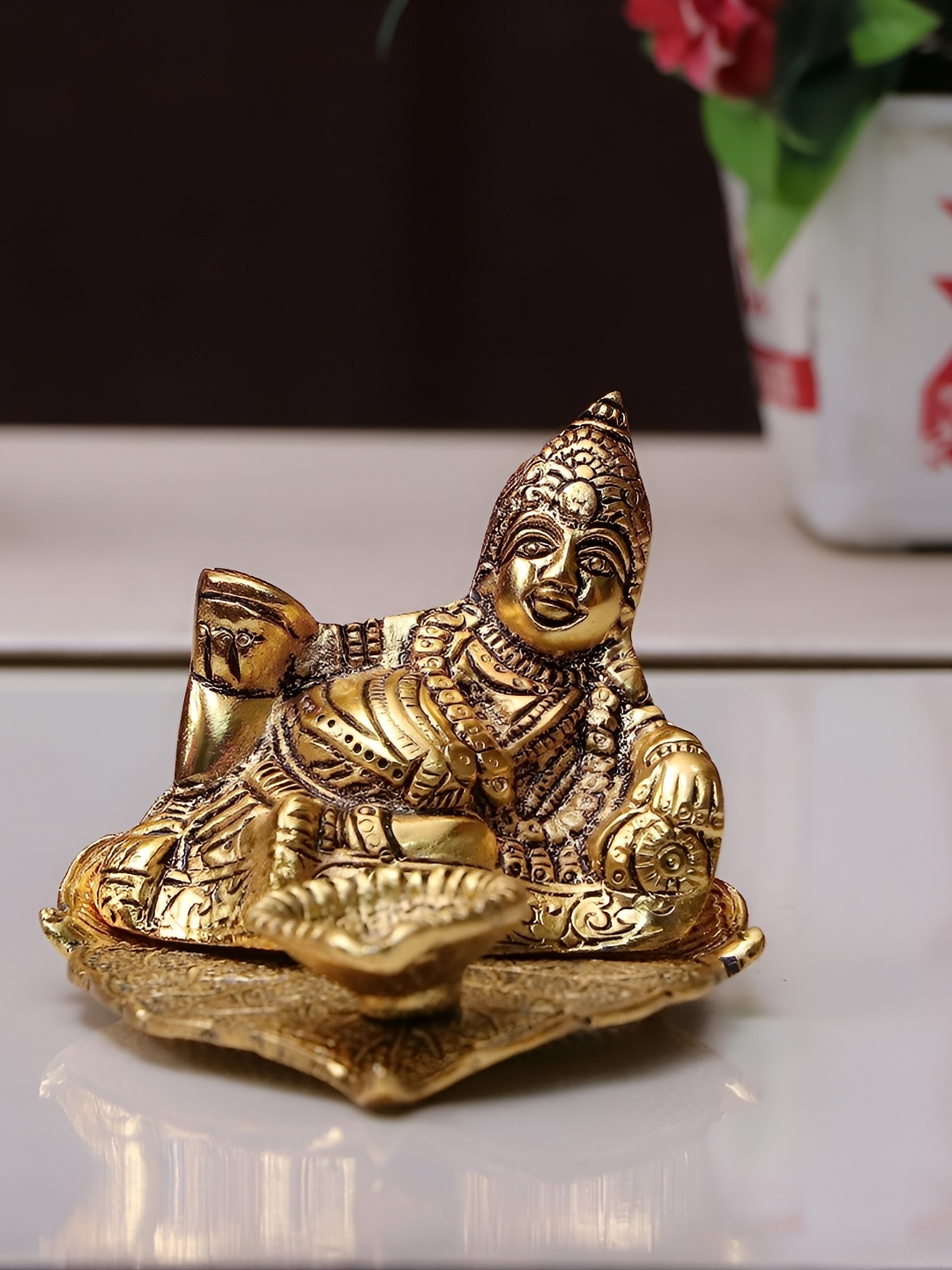 

Kridaykraft Gold-Toned Kubera Deepam Oil lamp Figurine Metal Showpiece