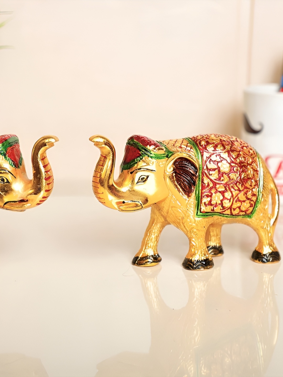 

Kridaykraft Gold-Toned 2 Pieces Metal Elephant Showpiece