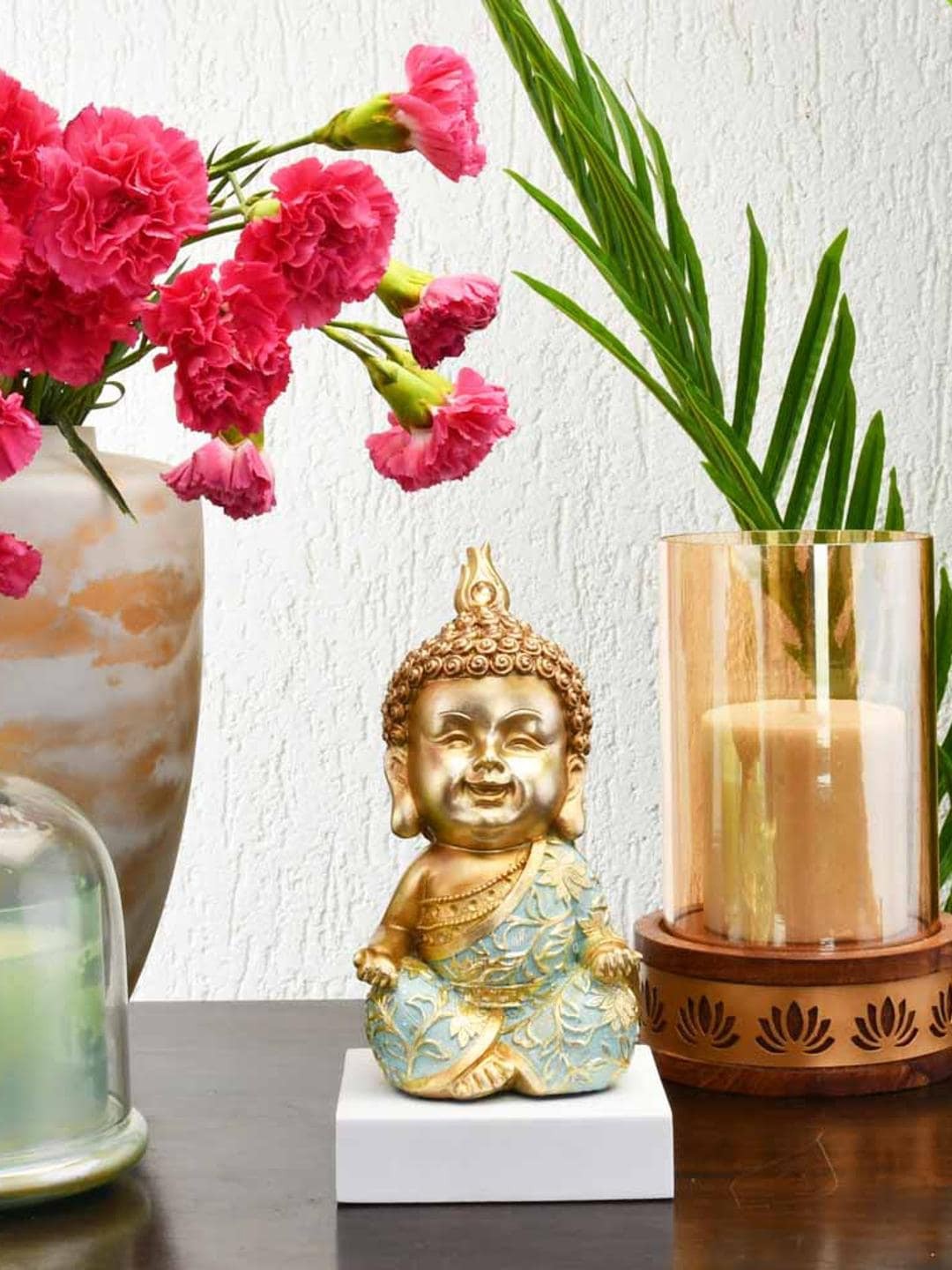 

Athome by Nilkamal Gold Toned & Green Baby Monk Nirvana Showpieces