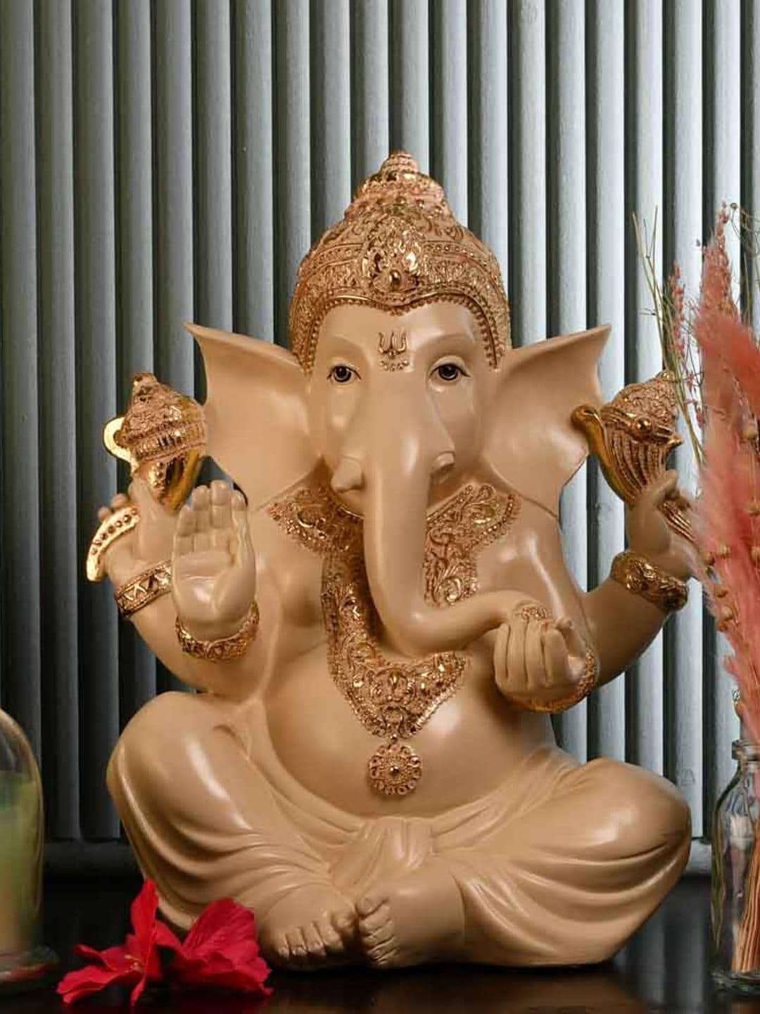 

Athome by Nilkamal Cream & Gold Toned Lord Ekdanta Ganesha Idol Showpiece