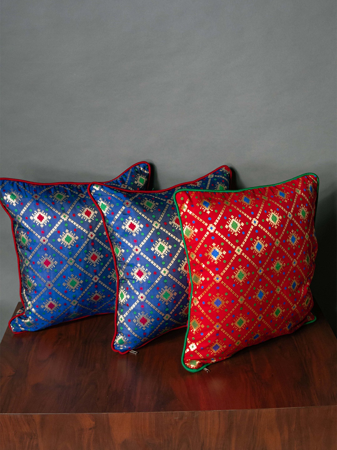 

RoyalDeco Blue & Red 3 Pieces Ethnic Motifs Brocade Square Cushion Covers