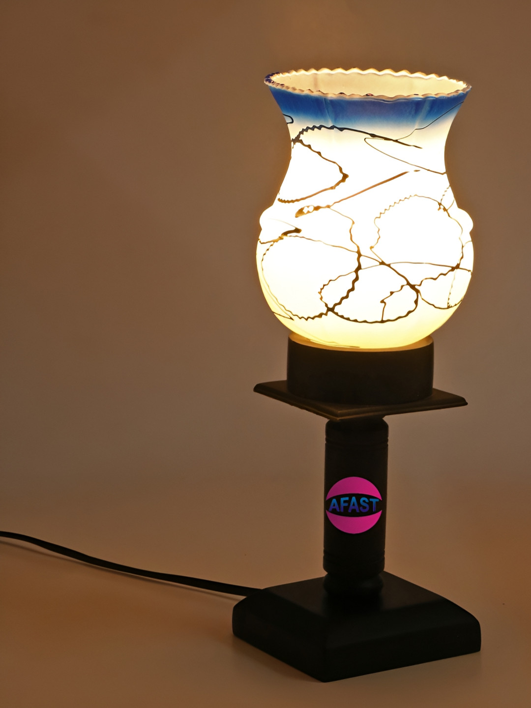 

Afast White & Blue Printed Wooden Abstract Shaped With Adjustable Cord Table Lamp