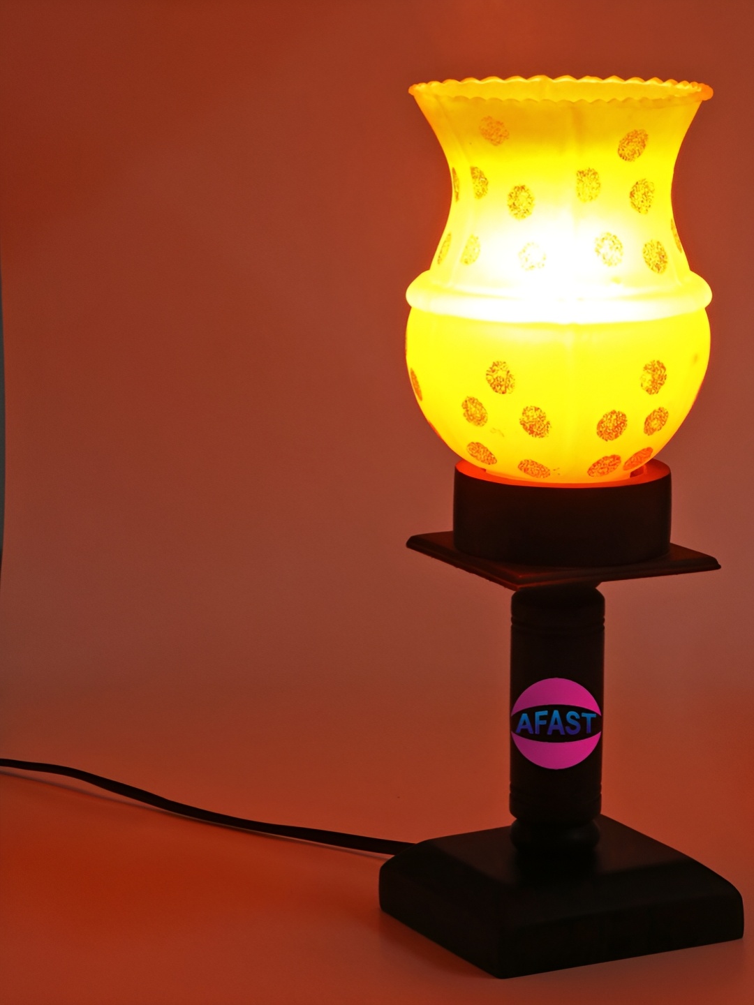 

Afast Orange & Yellow Printed Wooden Abstract Shaped With Adjustable Cord Table Lamp