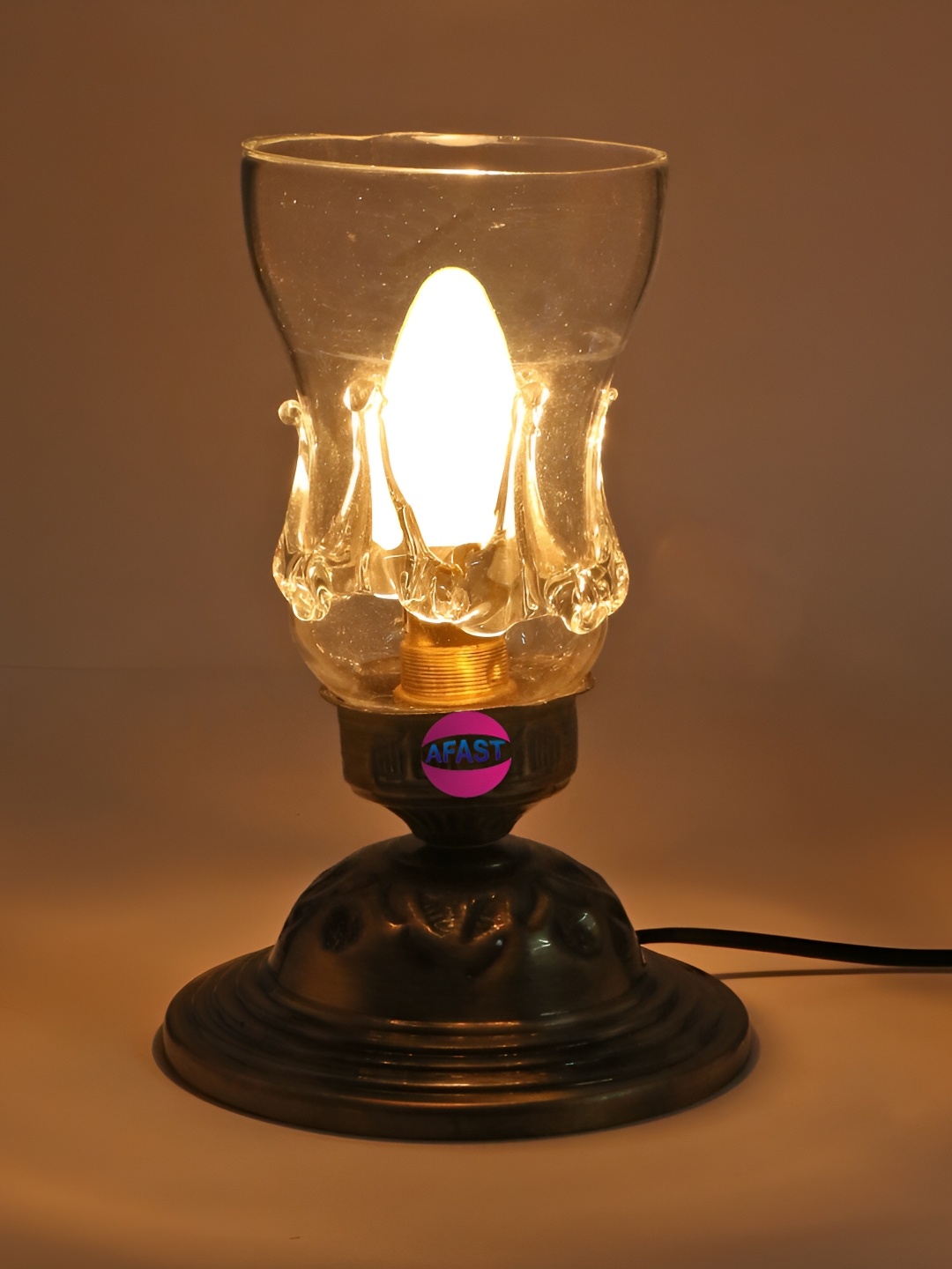 

Afast Silver Toned & Transparent Abstract Shaped Glass Table Lamp with Adjustable Cord