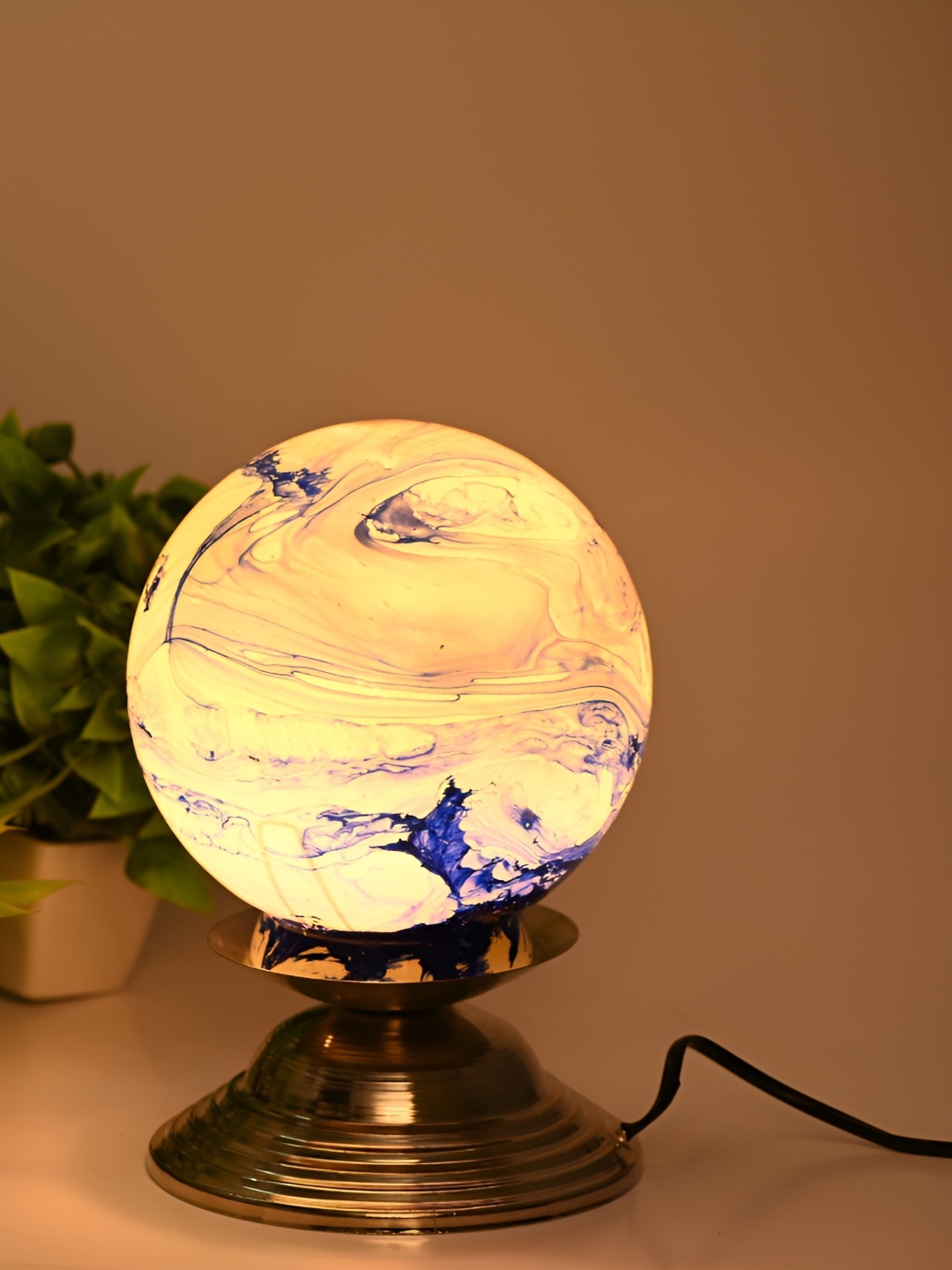 

Afast Silver Toned & Blue Printed Spherical Shaped Glass Table Lamp with Adjustable Cord