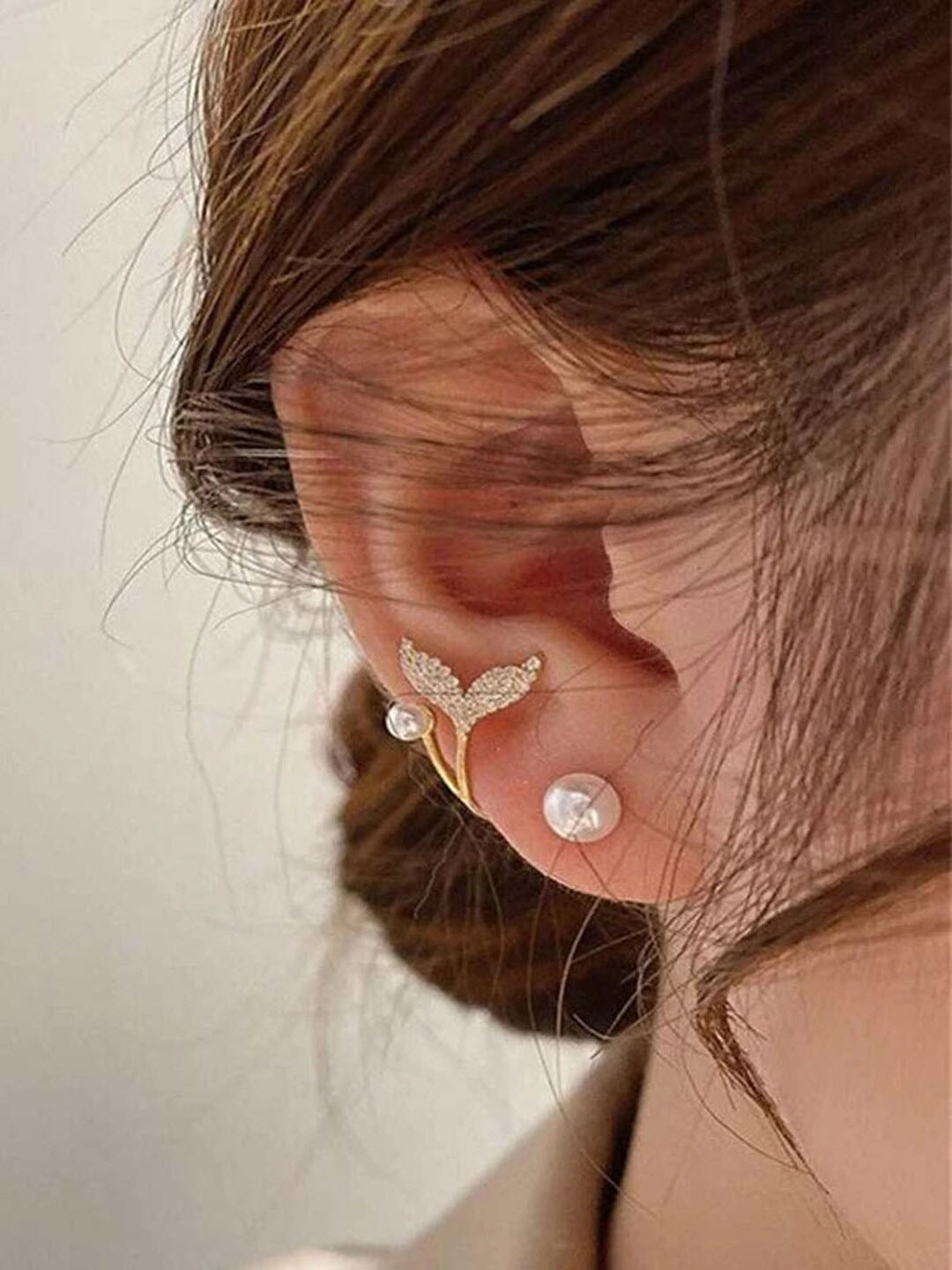 

Krelin Gold-Plated Pearl-Studded Fish Tail Studs Earrings