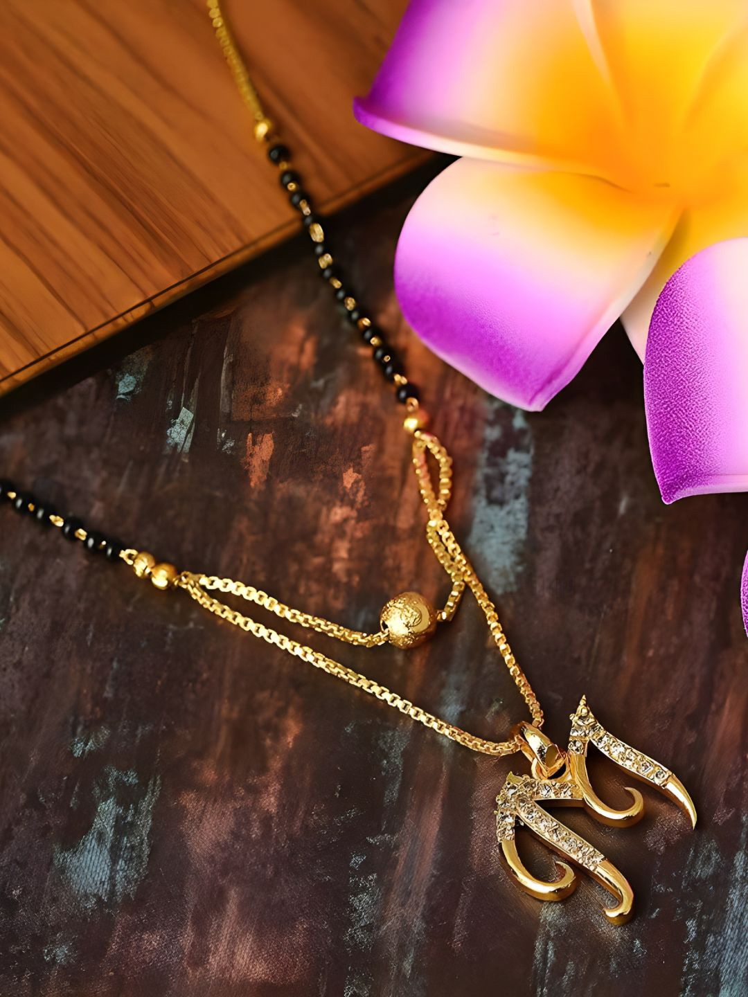 

ANNA CREATIONS Gold Plated Stone-Studded & Beaded Mangalsutra
