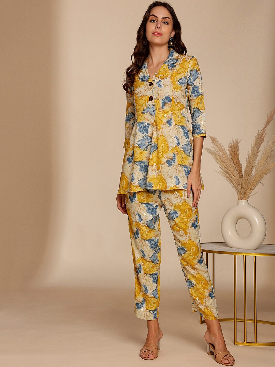 

Anouk Yellow Abstract Printed Printed A-Line Kurti & Trouser