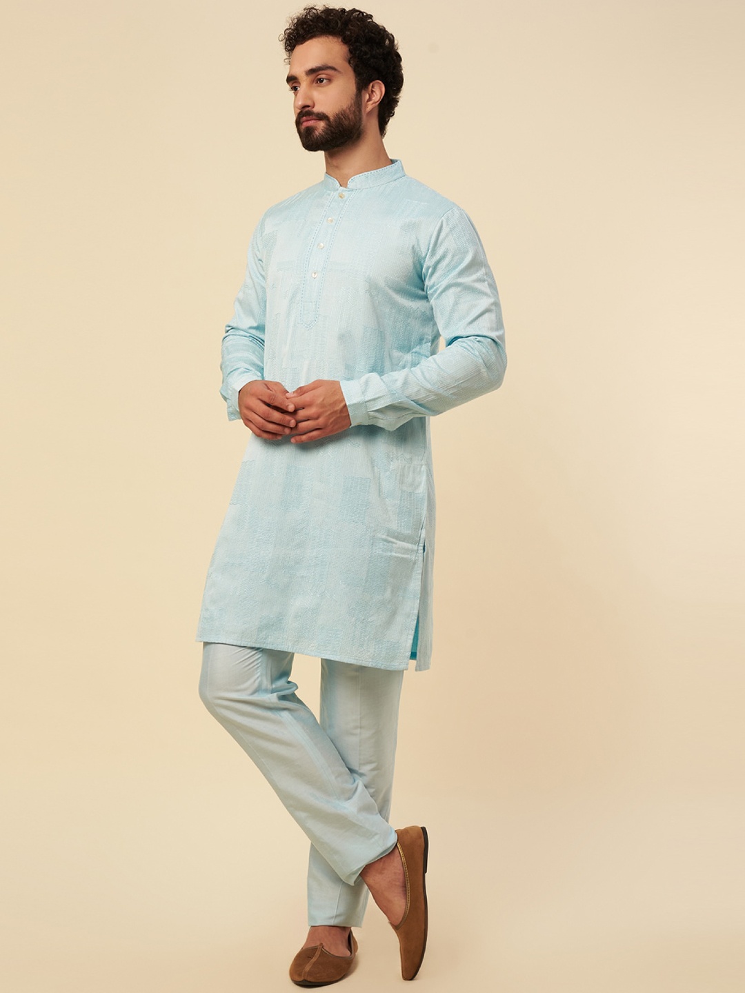 

Krishna Mehta Self Design Mandarin Collar Thread Work Kurta With Trousers, Blue