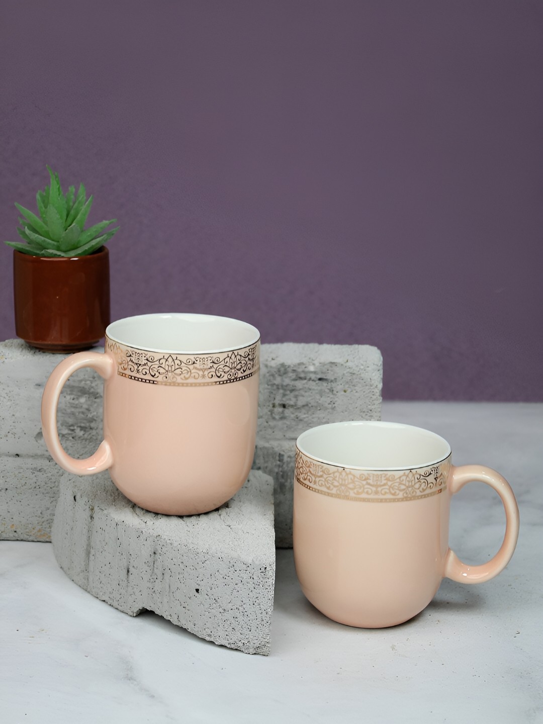 

Vola Global LLP Sparkle Peach 2 Pieces Porcelain with Golden Border Glossy Cups 200 ML