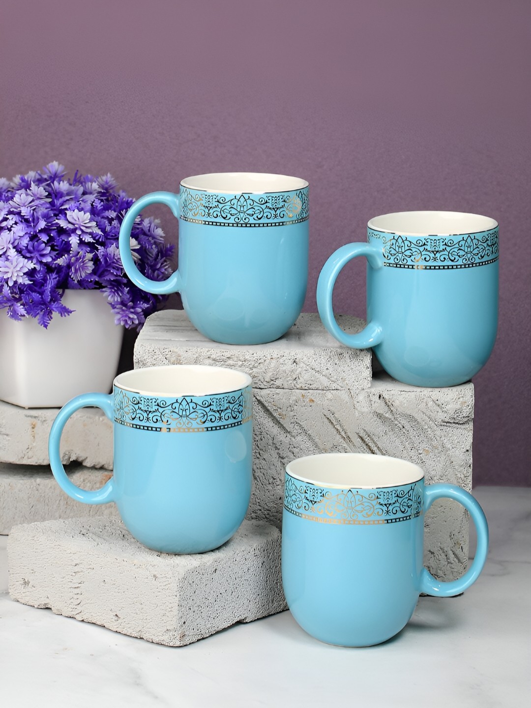 

Vola Global LLP Dazzle White 4 pieces Porcelain With Golden Border Glossy Cups 300 ML Each, Blue