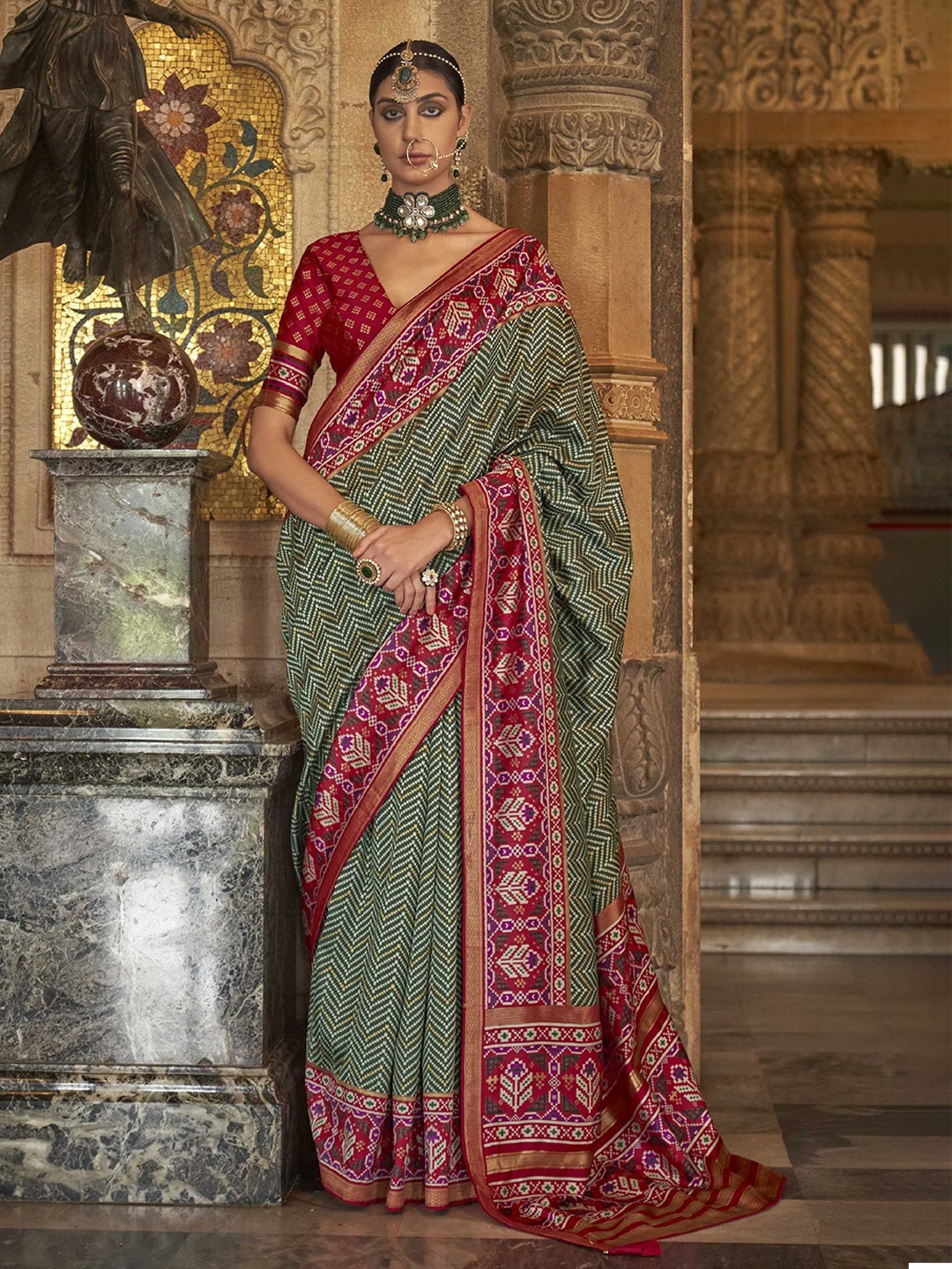 

Mitera Green Geometric Printed Zari Patola Saree