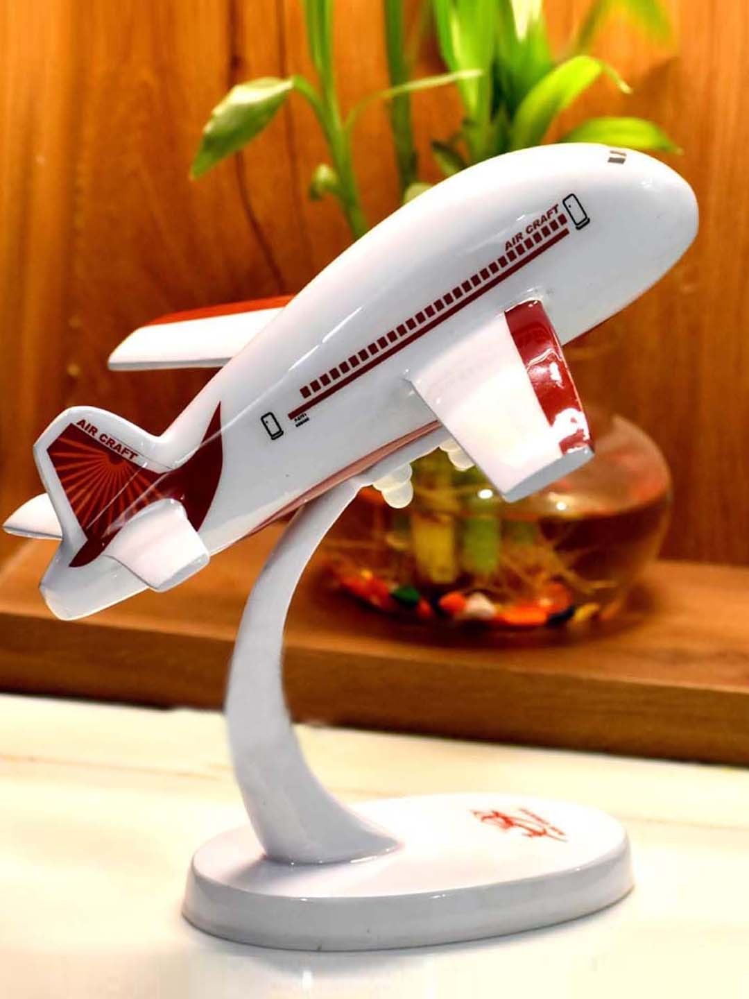 

DSH Crafting Your Curiosity White & Red Aeroplane Showpieces
