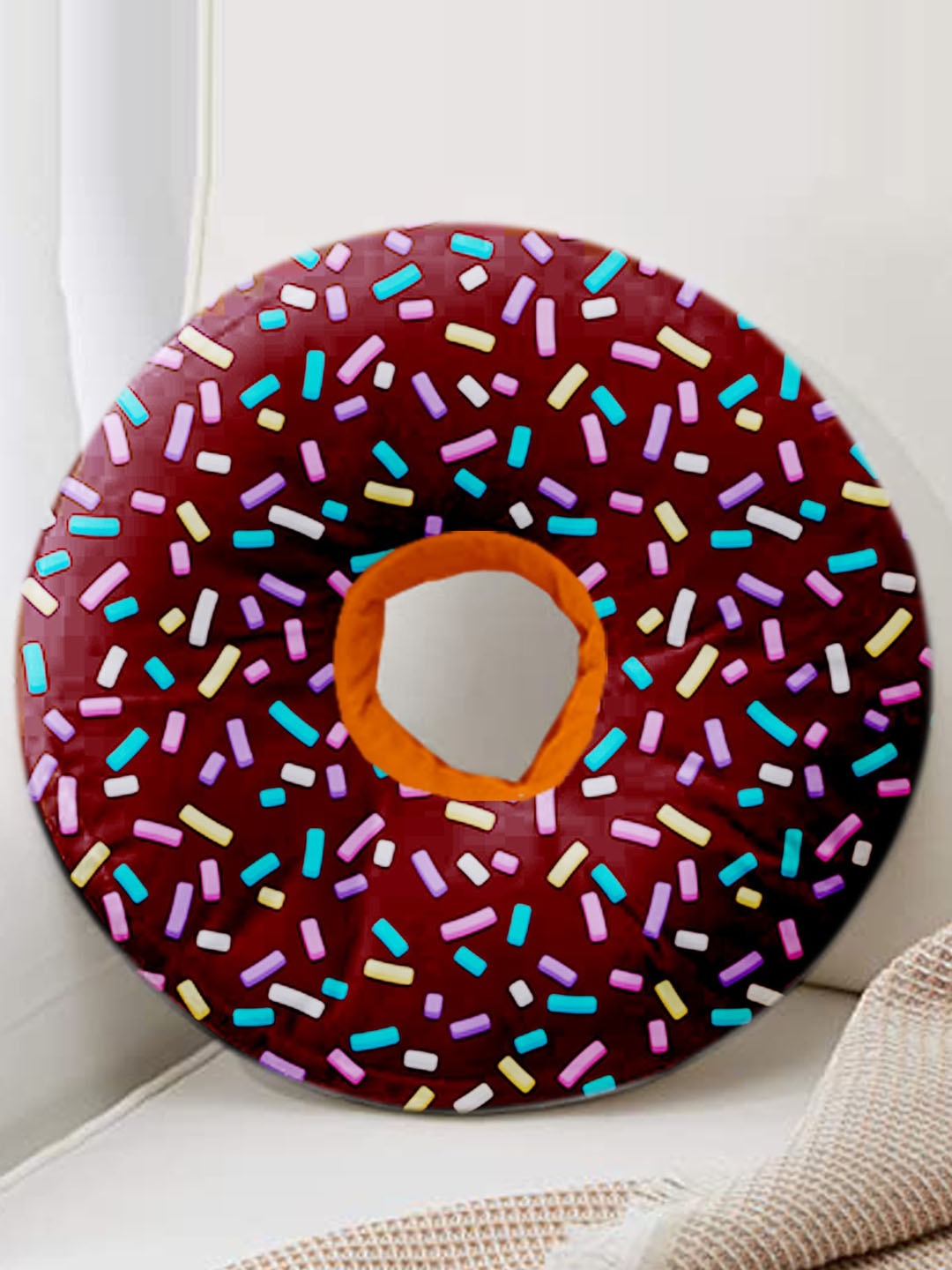

ME & YOU Maroon & Blue Printed Fibre Filling Donut Shape Cushion