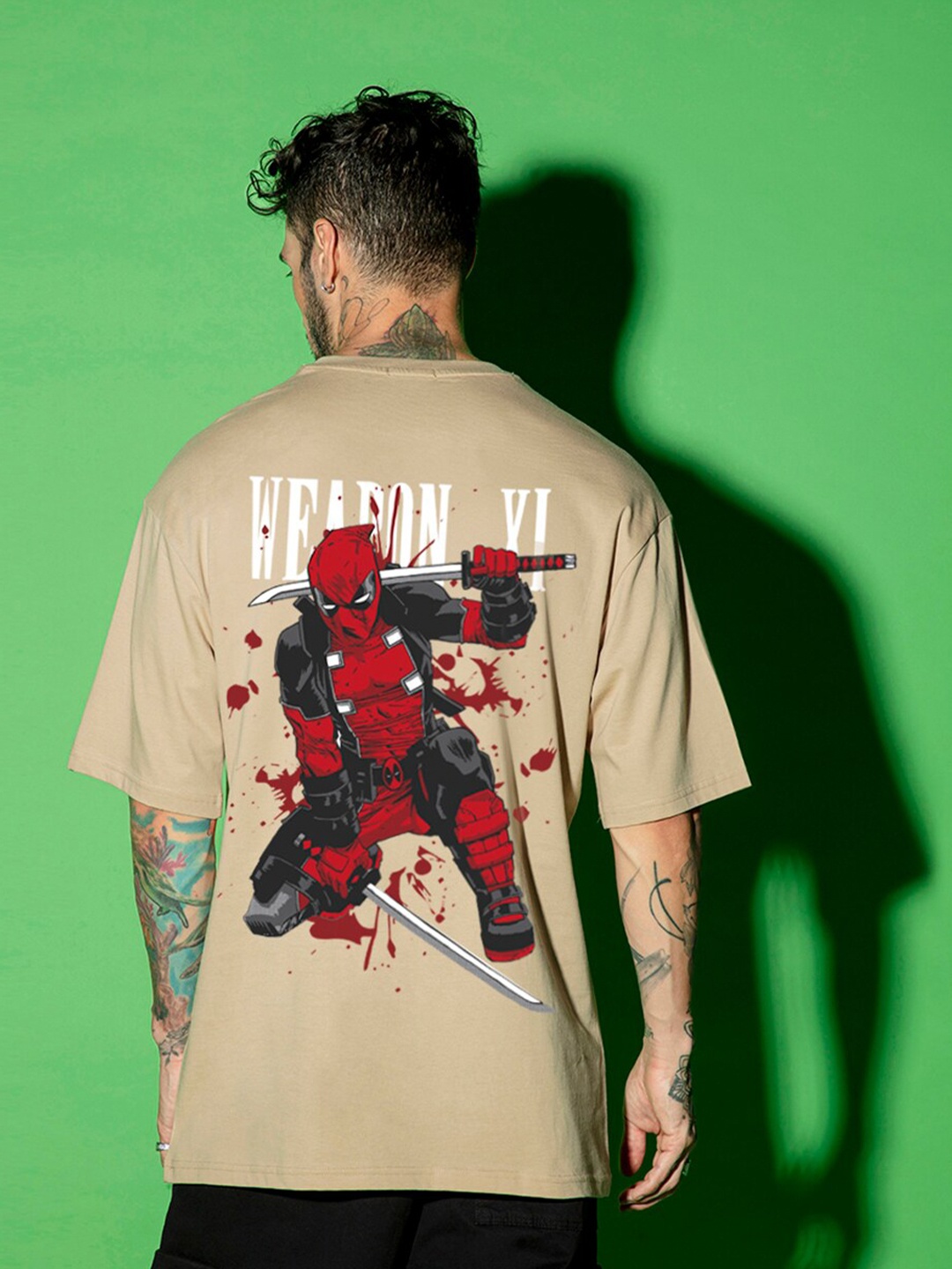

Bewakoof Brown Graphic Printed Drop-Shoulder Sleeves Oversized Cotton T-shirt