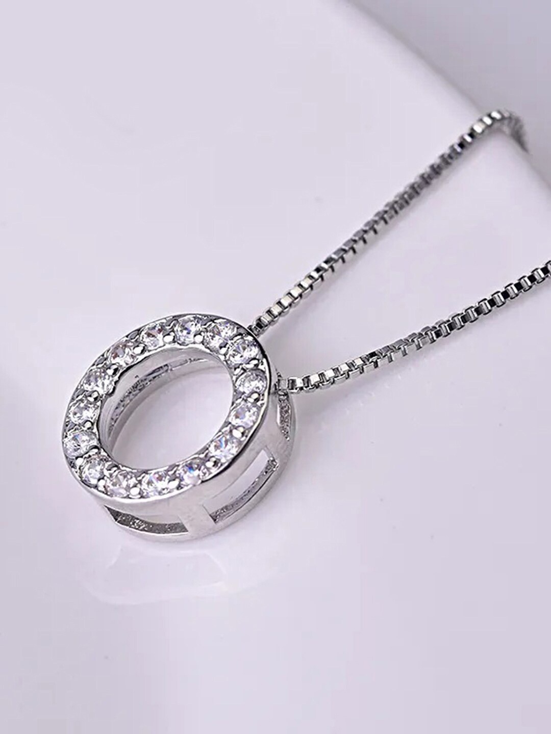 

Peora Silver-Plated Cubic Zirconia Studded Round Pendant With Chain