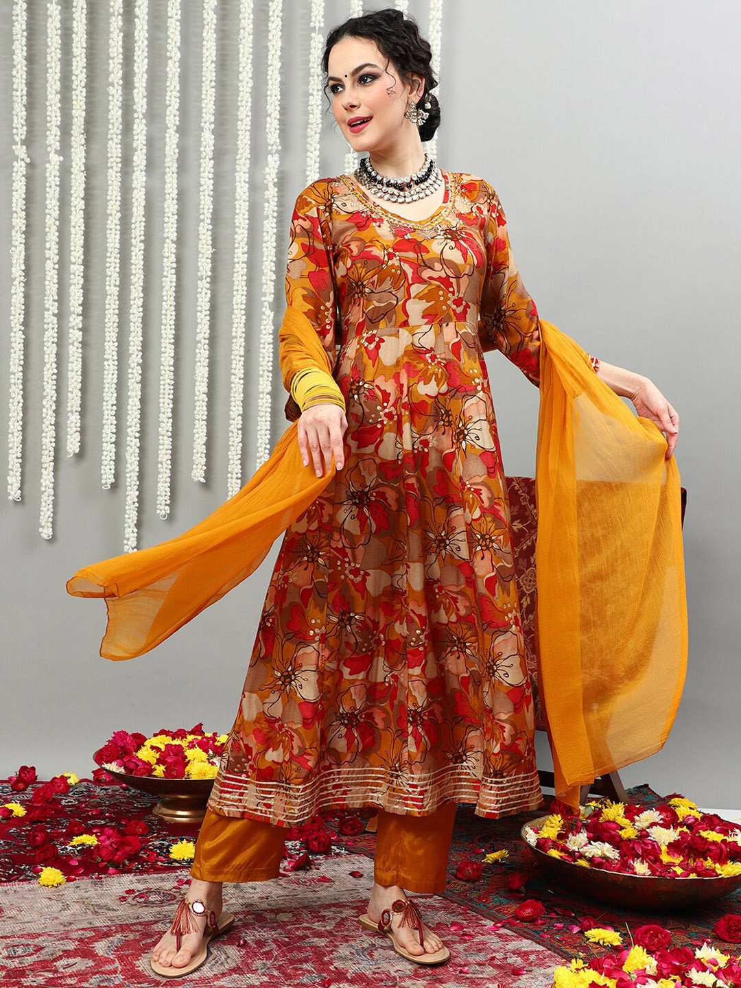 

Vastramyaa Floral Printed Beads and Stones Pure Silk Kurta & Trousers With Dupatta, Mustard