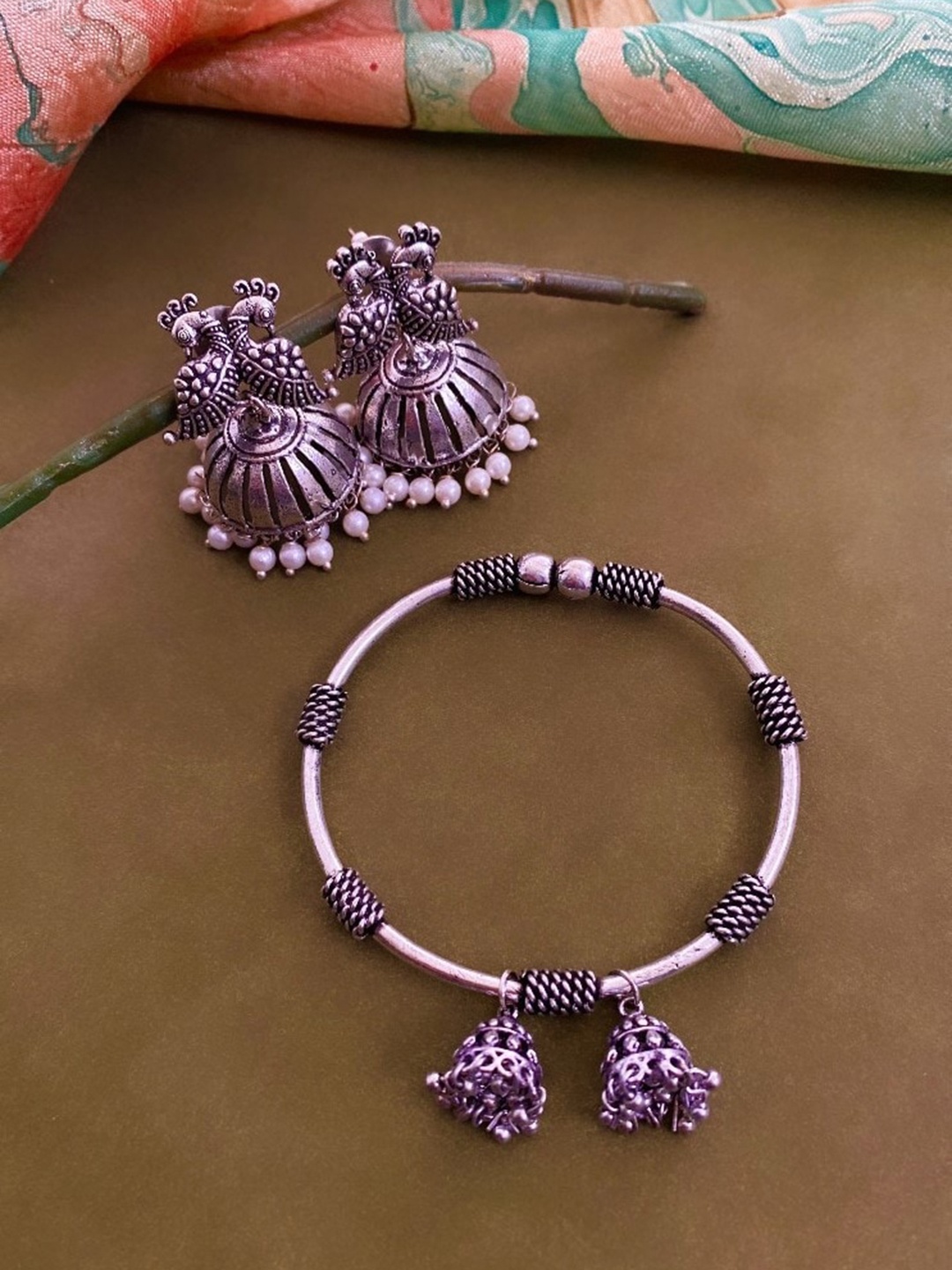 

ATIBELLE German Silver-Plated Peacock Shaped Beaded Jhumkas & Bangle